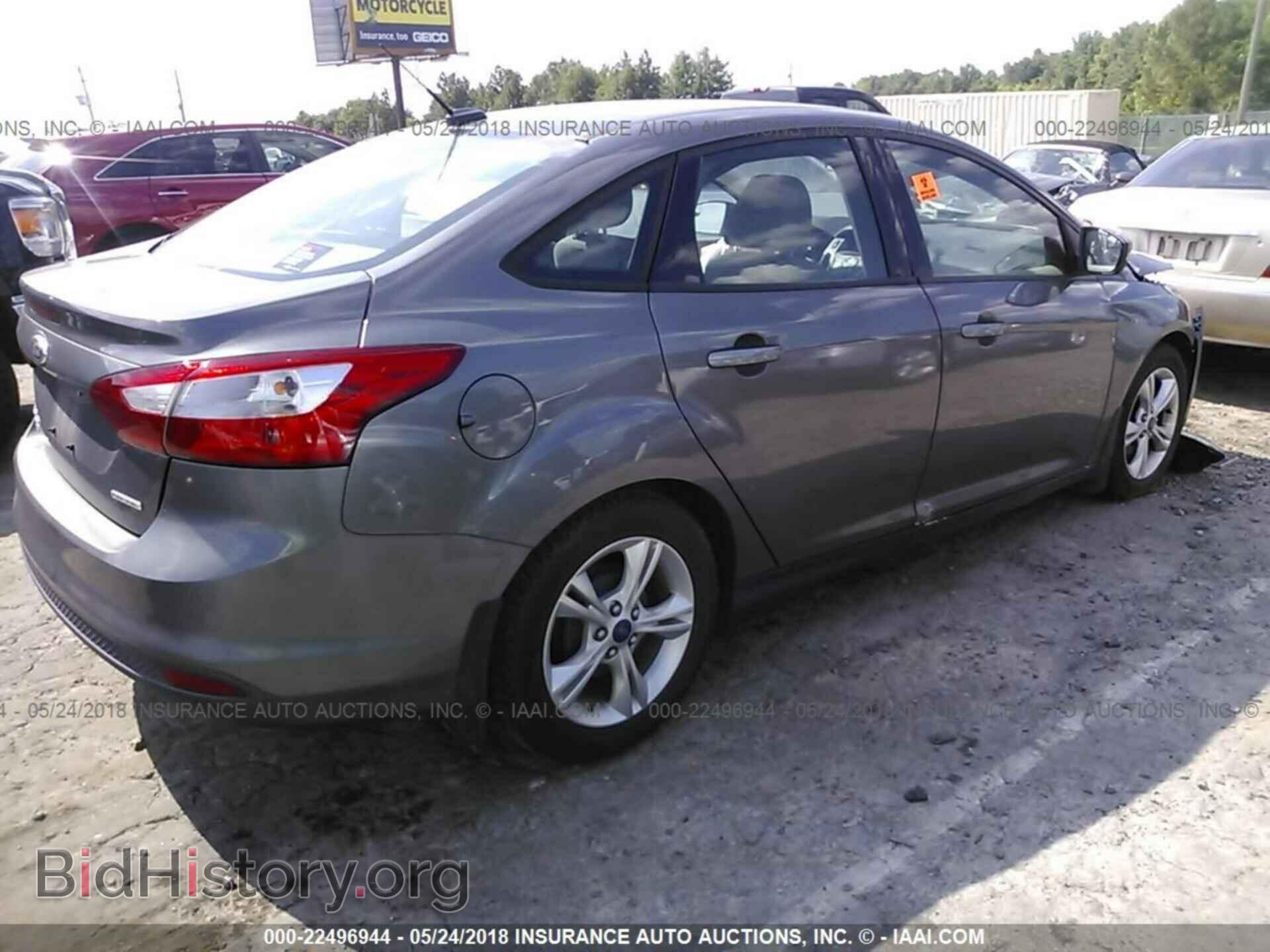 2014 Ford Focus - VIN: 1FADP3F20EL103535 - Фото 4