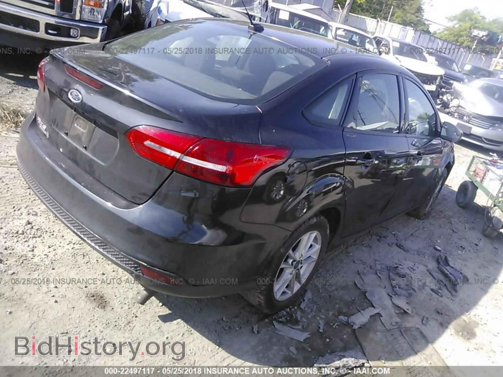 2015 Ford Focus - VIN: 1FADP3F24FL213294 - Photo 4