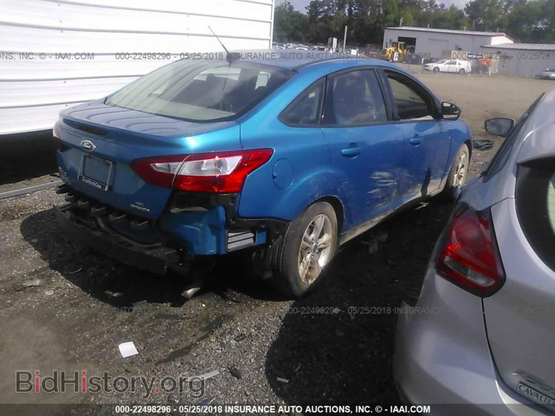 2014 Ford Focus - VIN: 1FADP3F26EL458614 - Фото 4