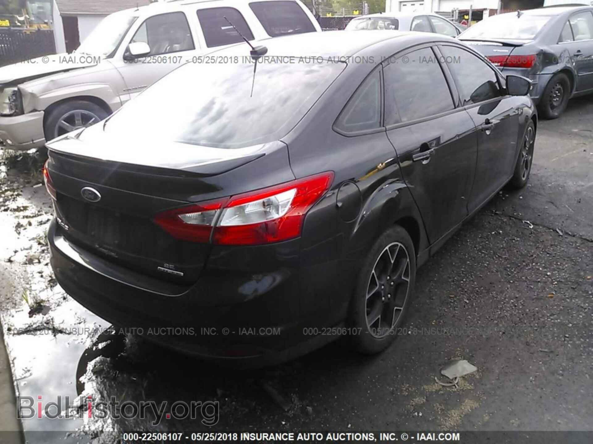 2014 Ford Focus - VIN: 1FADP3F21EL236790 - Фото 4