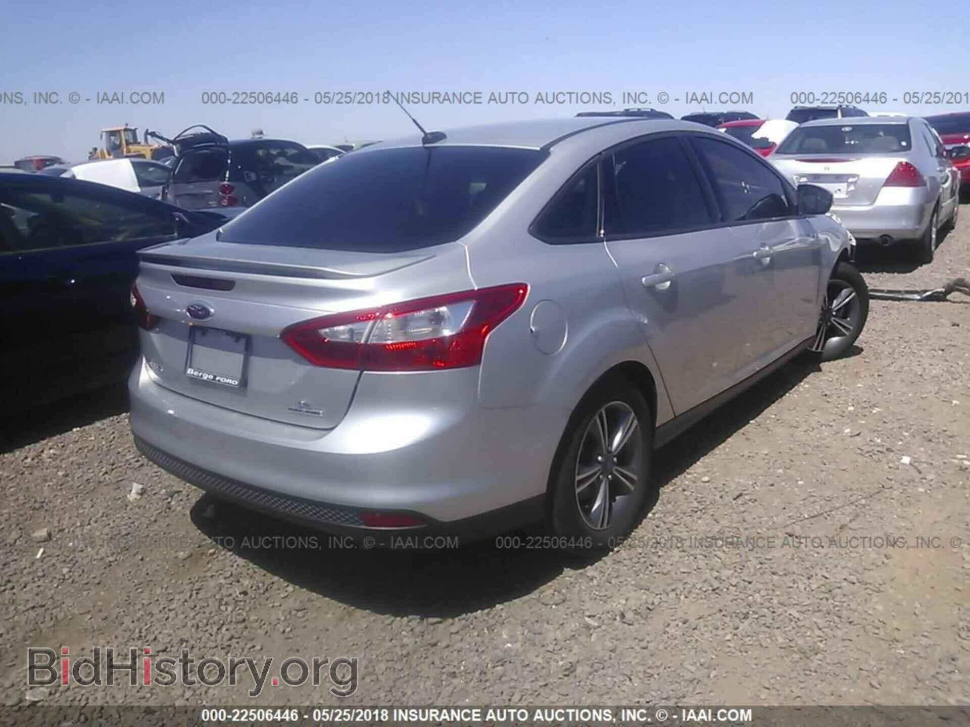 2014 Ford Focus - VIN: 1FADP3F28EL399548 - Photo 4