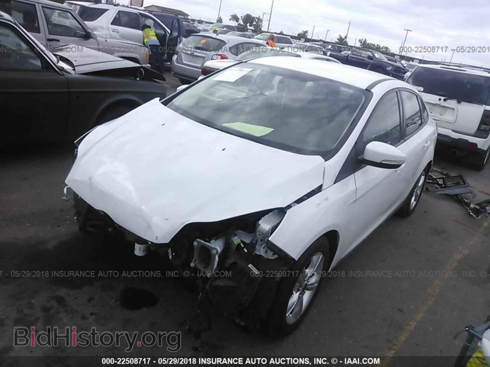 2014 Ford Focus - VIN: 1FADP3F20EL323127 - Фото 2
