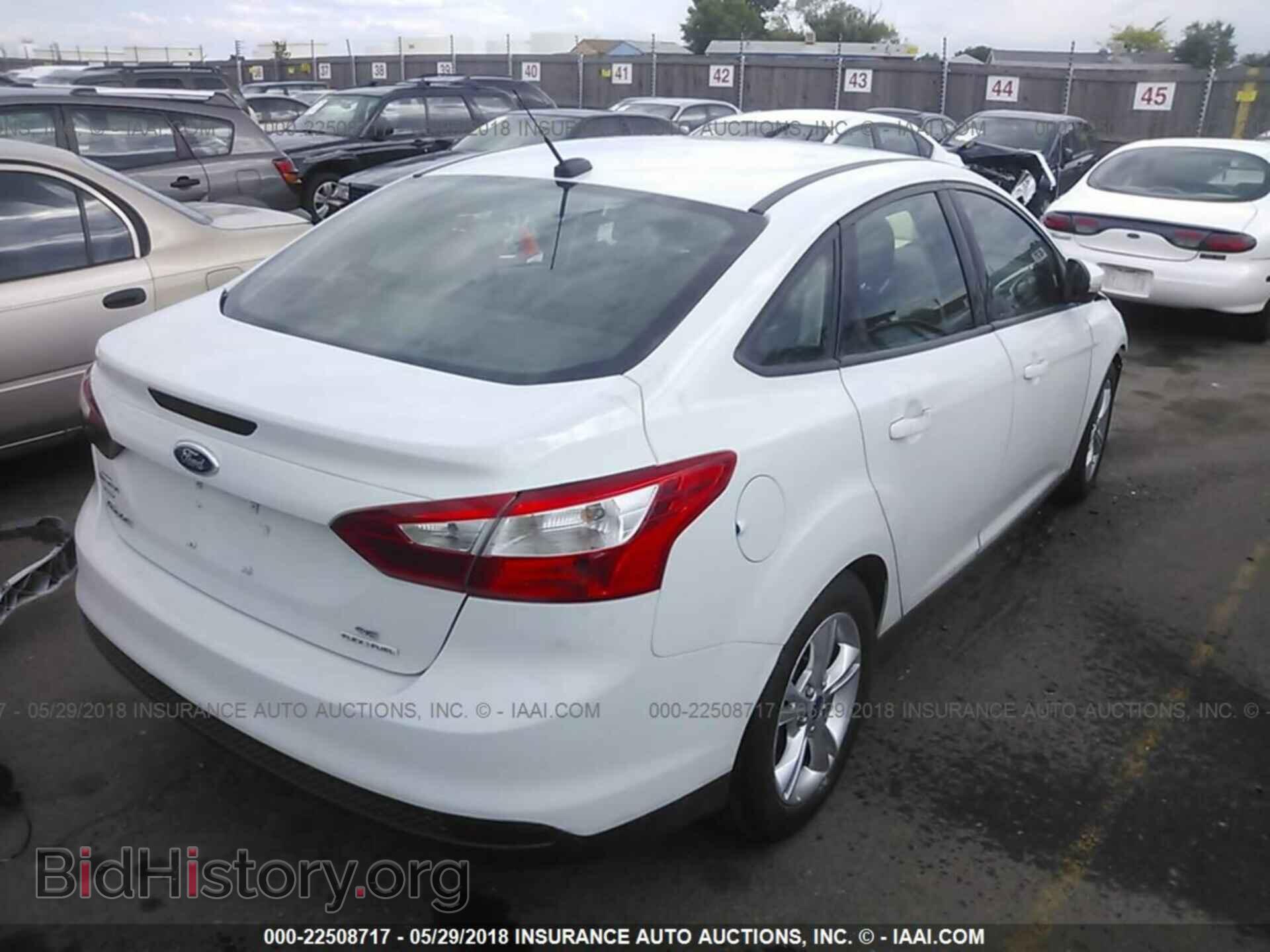 2014 Ford Focus - VIN: 1FADP3F20EL323127 - Фото 4
