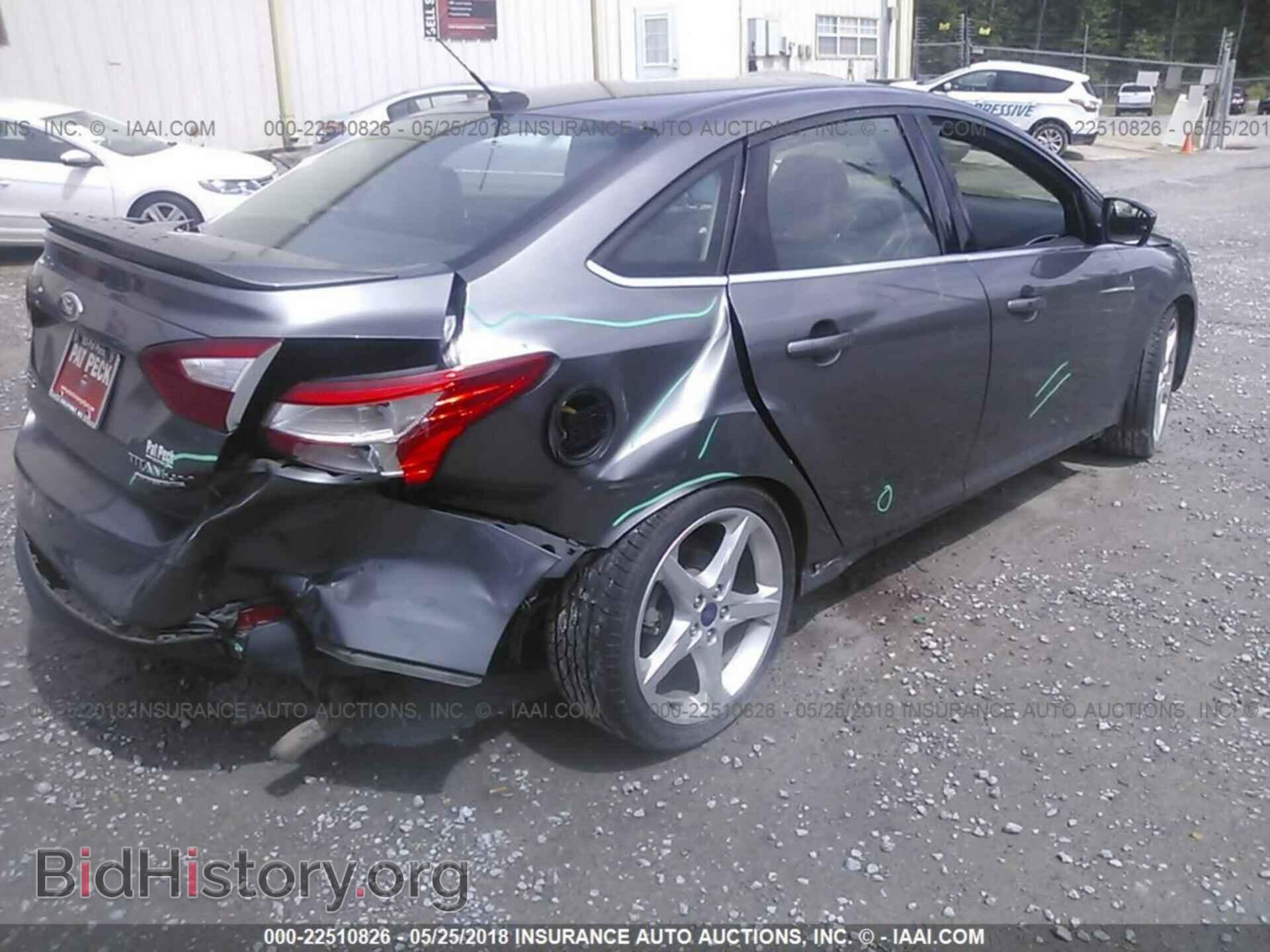 2014 Ford Focus - VIN: 1FADP3J2XEL142012 - Photo 4