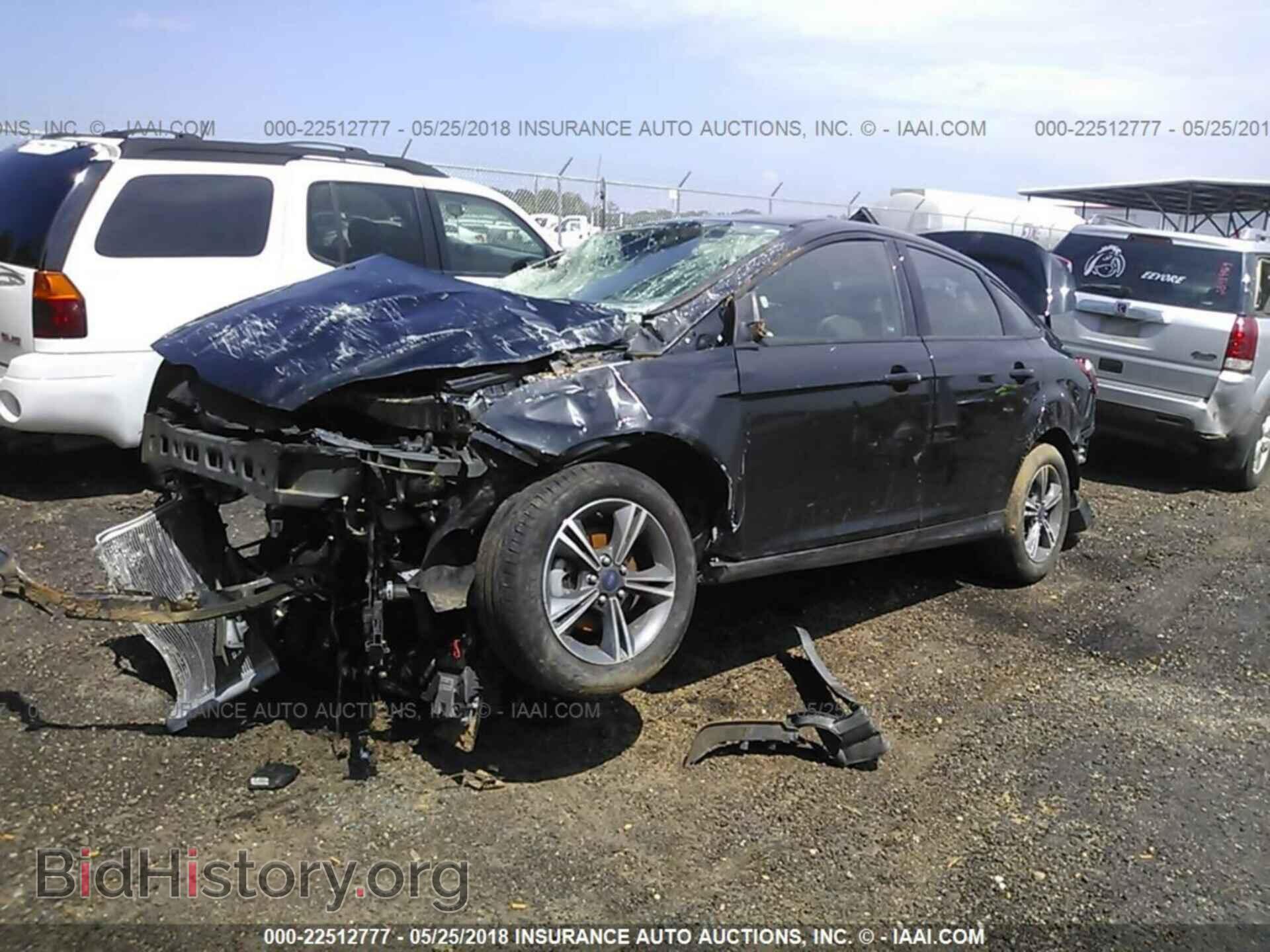 2014 Ford Focus - VIN: 1FADP3F20EL403348 - Фото 2