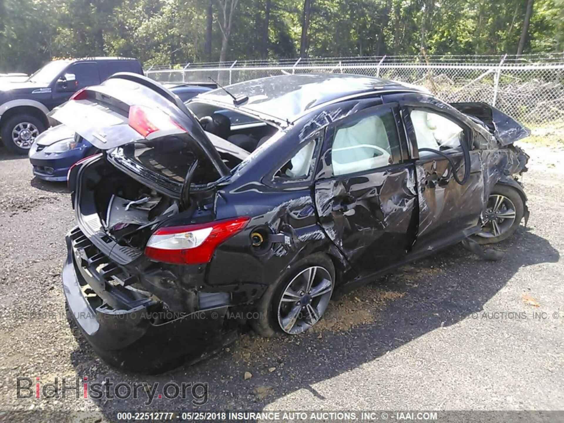 2014 Ford Focus - VIN: 1FADP3F20EL403348 - Фото 4