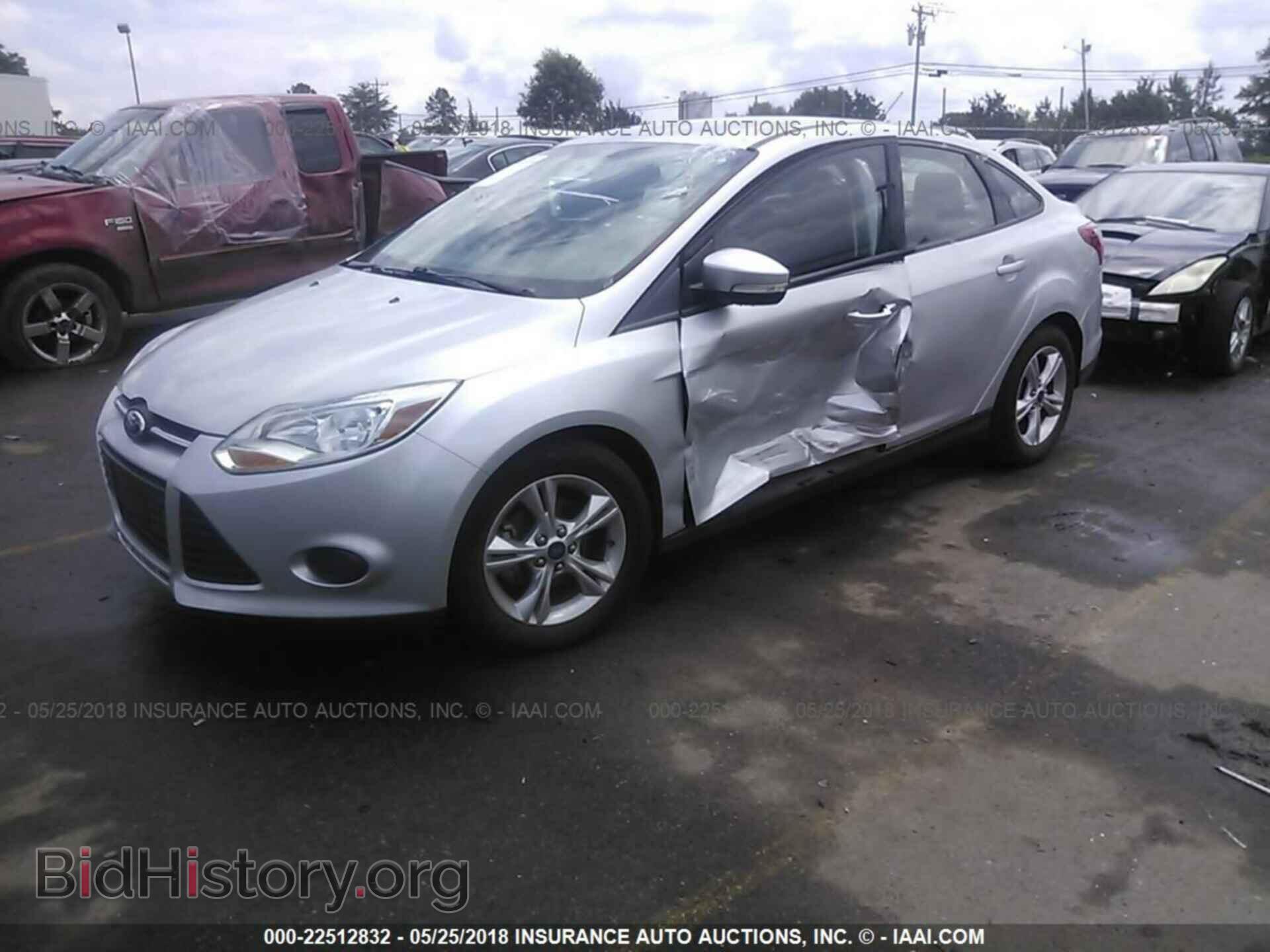 2014 Ford Focus - VIN: 1FADP3F29EL309582 - Photo 2