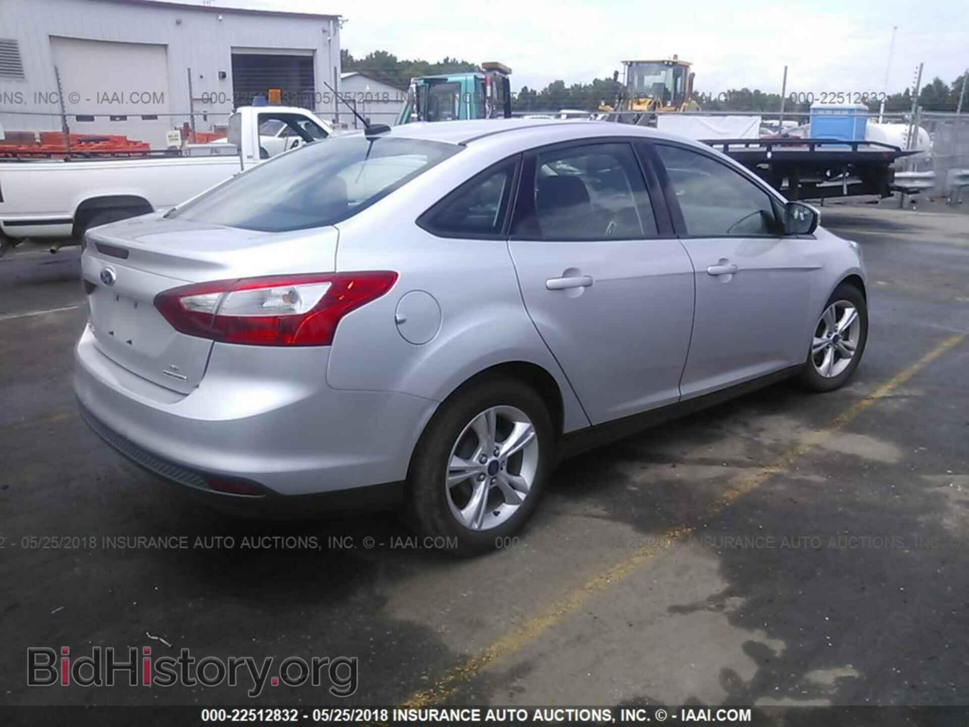 2014 Ford Focus - VIN: 1FADP3F29EL309582 - Photo 4