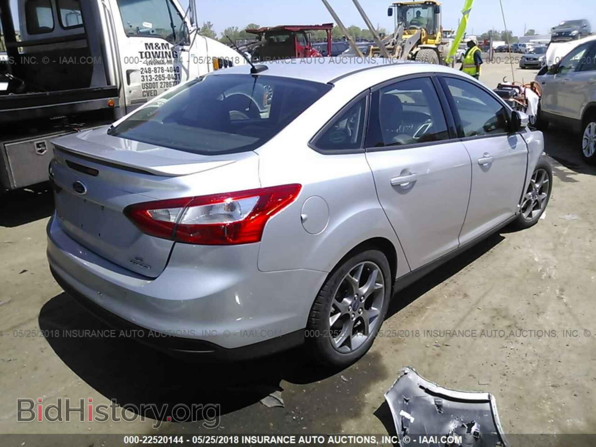 2014 Ford Focus - VIN: 1FADP3F26EL411213 - Photo 4