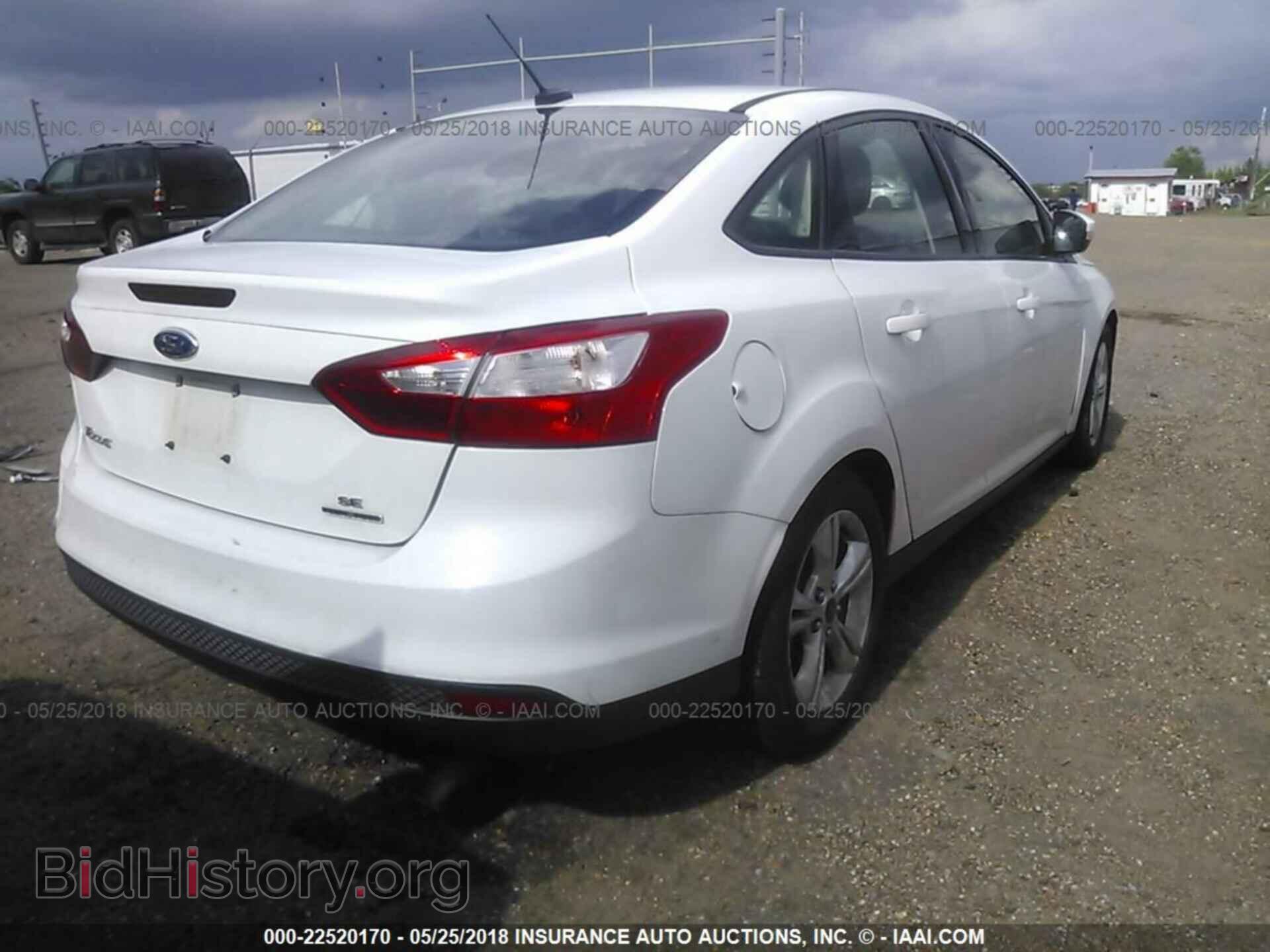 2014 Ford Focus - VIN: 1FADP3F20EL279825 - Фото 4
