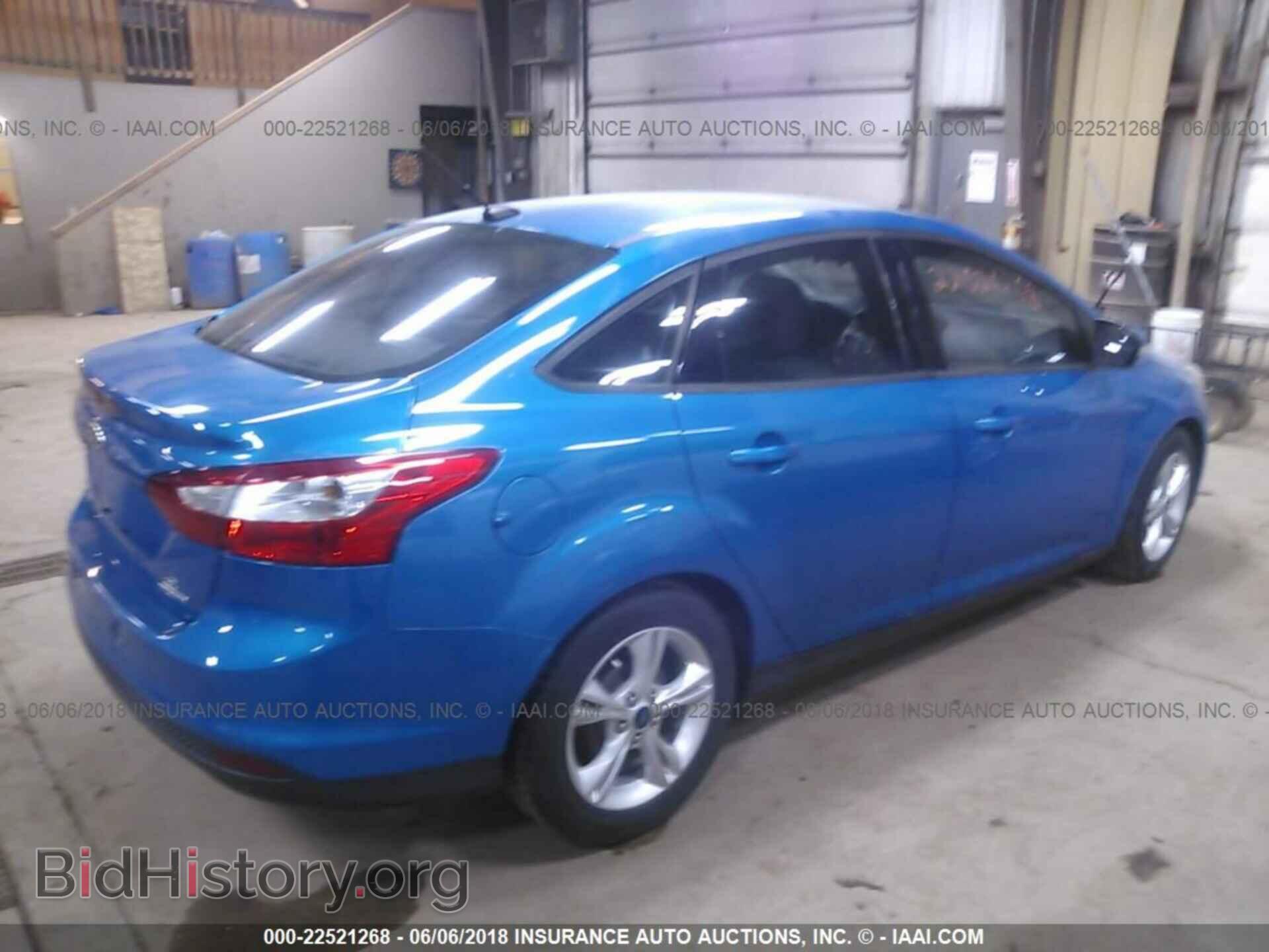 2014 Ford Focus - VIN: 1FADP3F25EL409825 - Фото 4