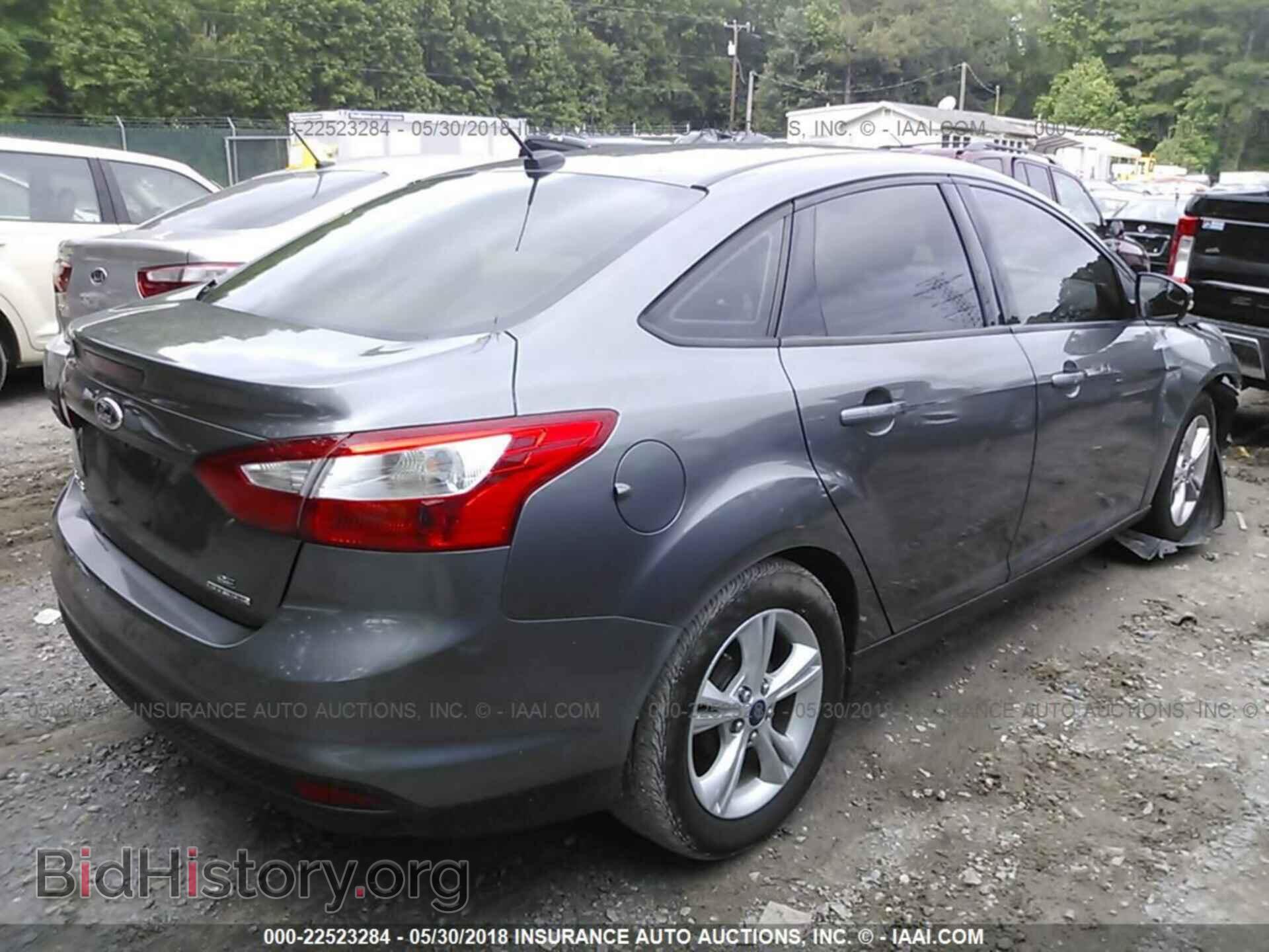 2014 Ford Focus - VIN: 1FADP3F27EL354844 - Photo 4