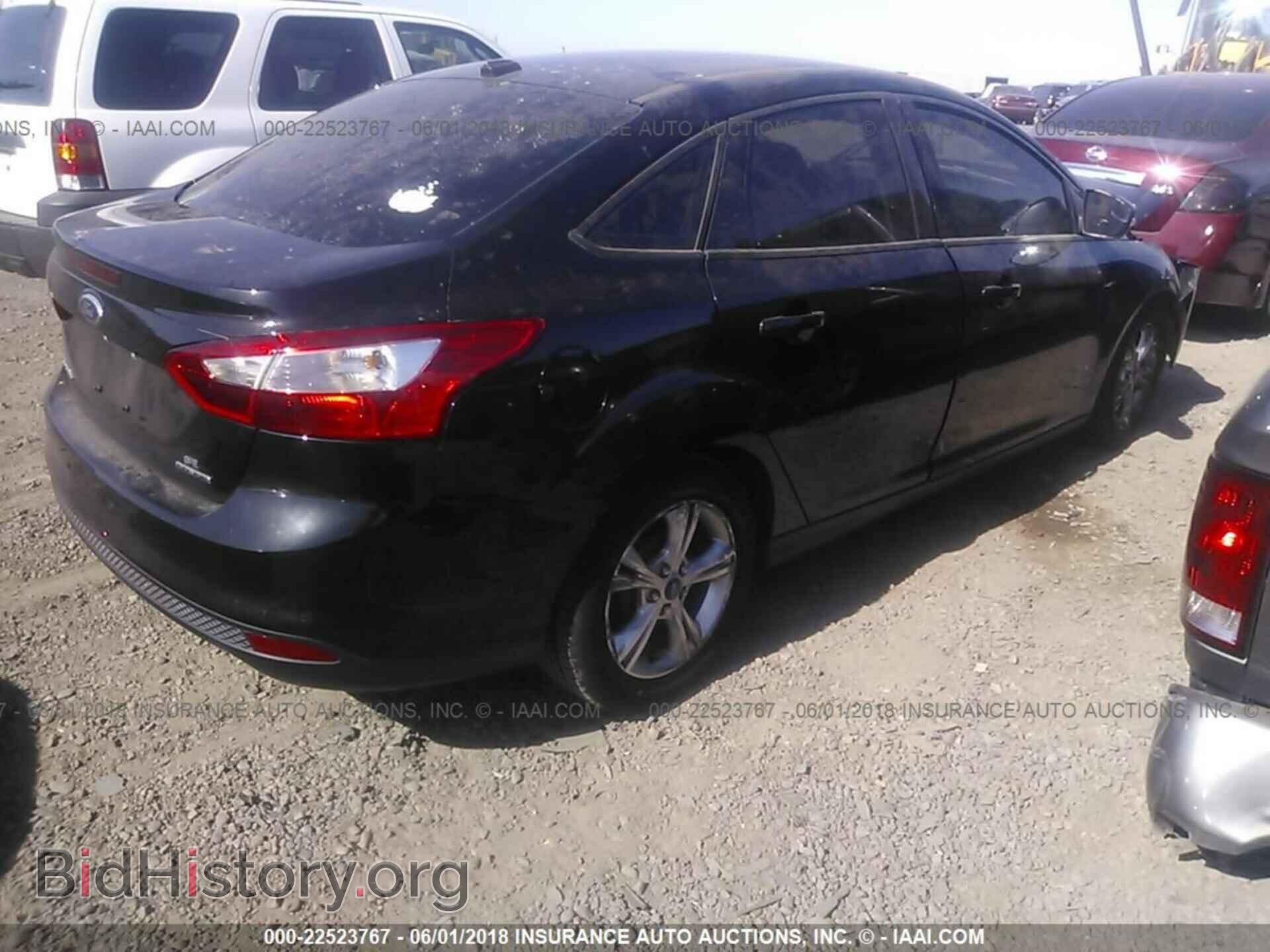 2014 Ford Focus - VIN: 1FADP3F24EL110293 - Фото 4