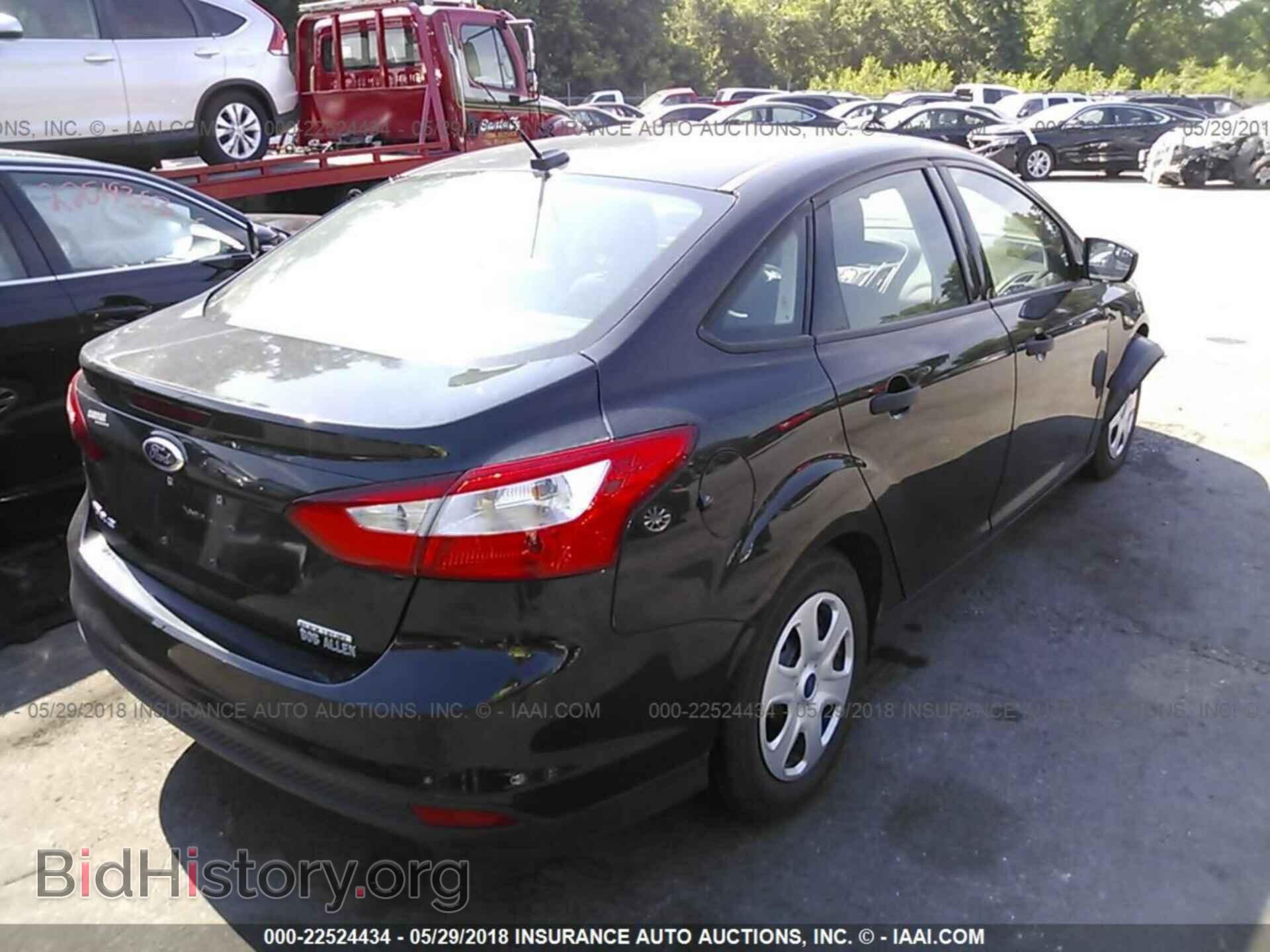 2014 Ford Focus - VIN: 1FADP3E22EL270710 - Фото 4