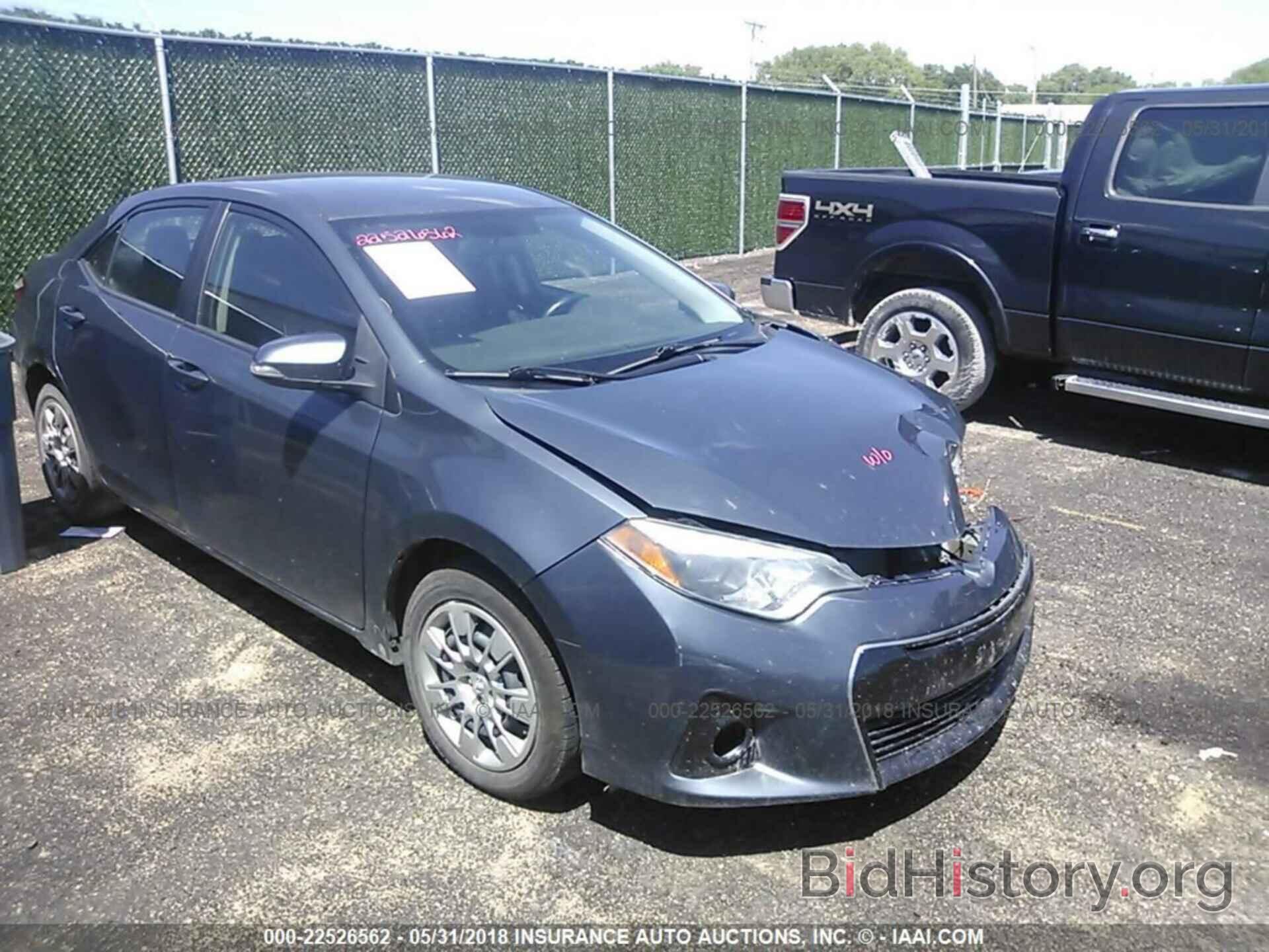 Photo 5YFBURHE6EP112087 - Toyota Corolla 2014