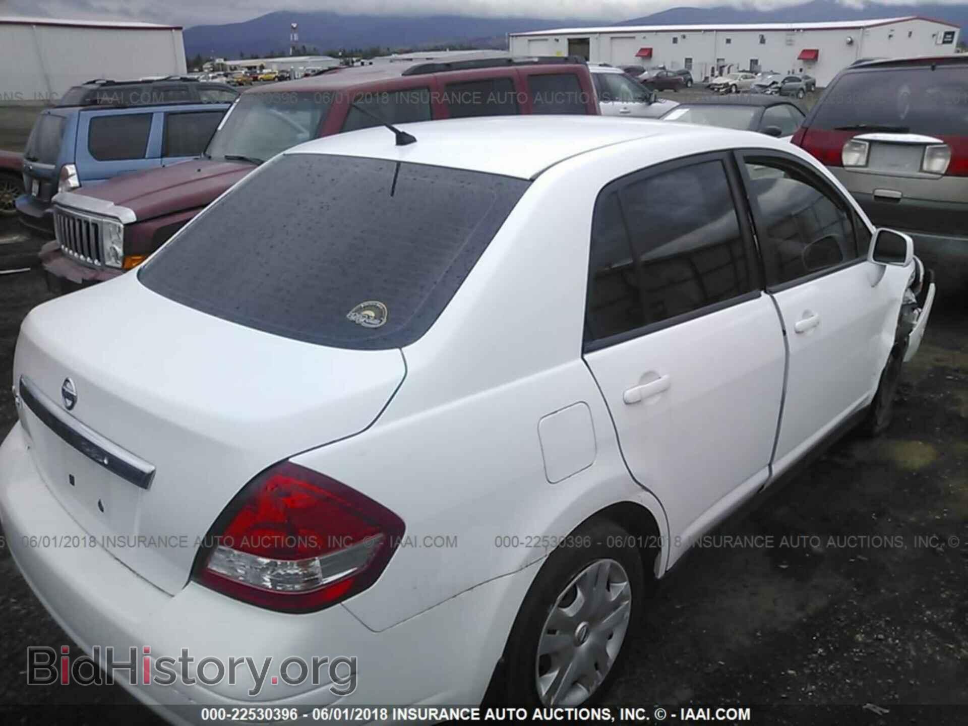 2011 Nissan Versa - VIN: 3N1BC1AP1BL453893 - Фото 4