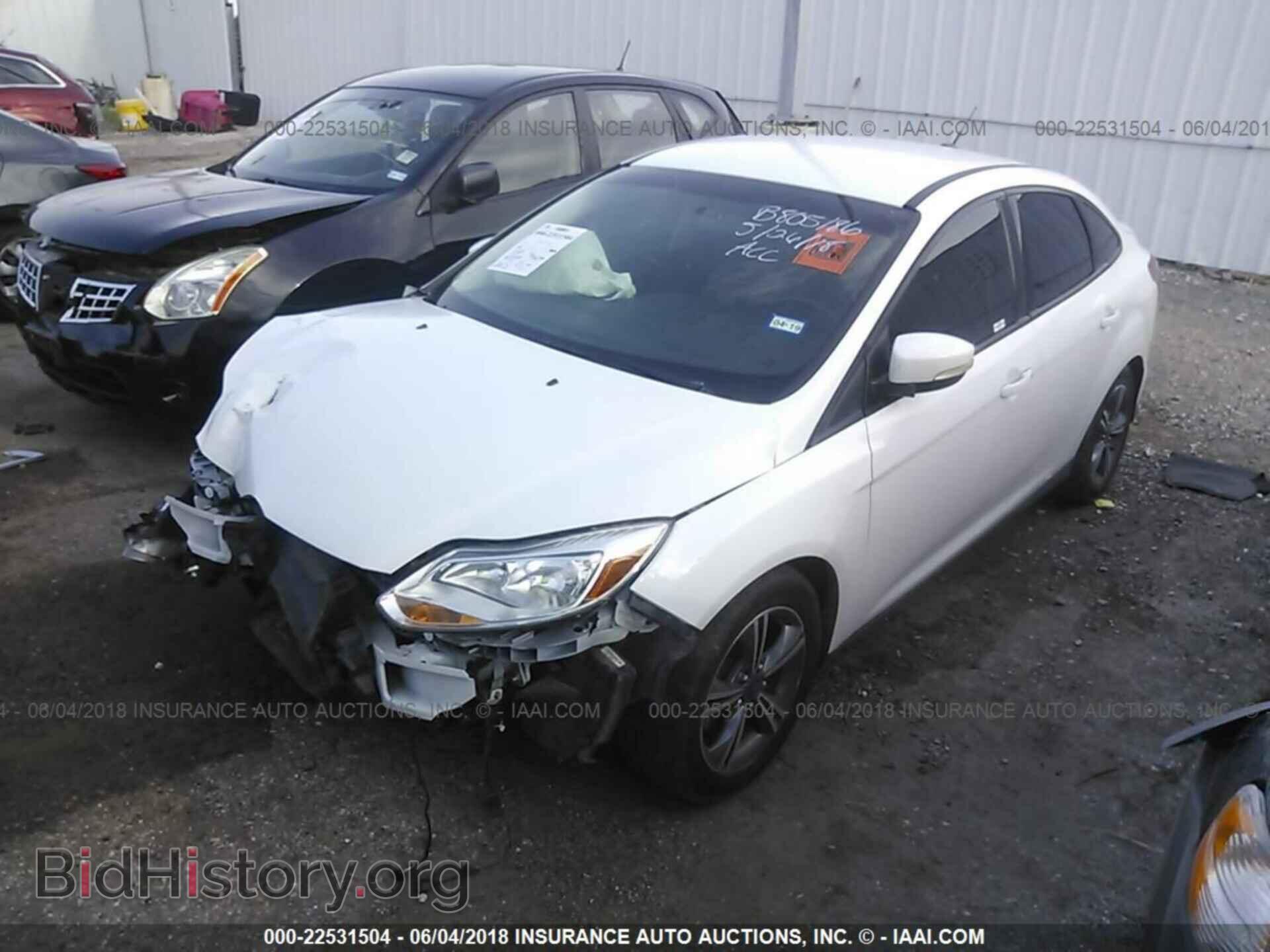 2014 Ford Focus - VIN: 1FADP3F24EL293579 - Photo 2