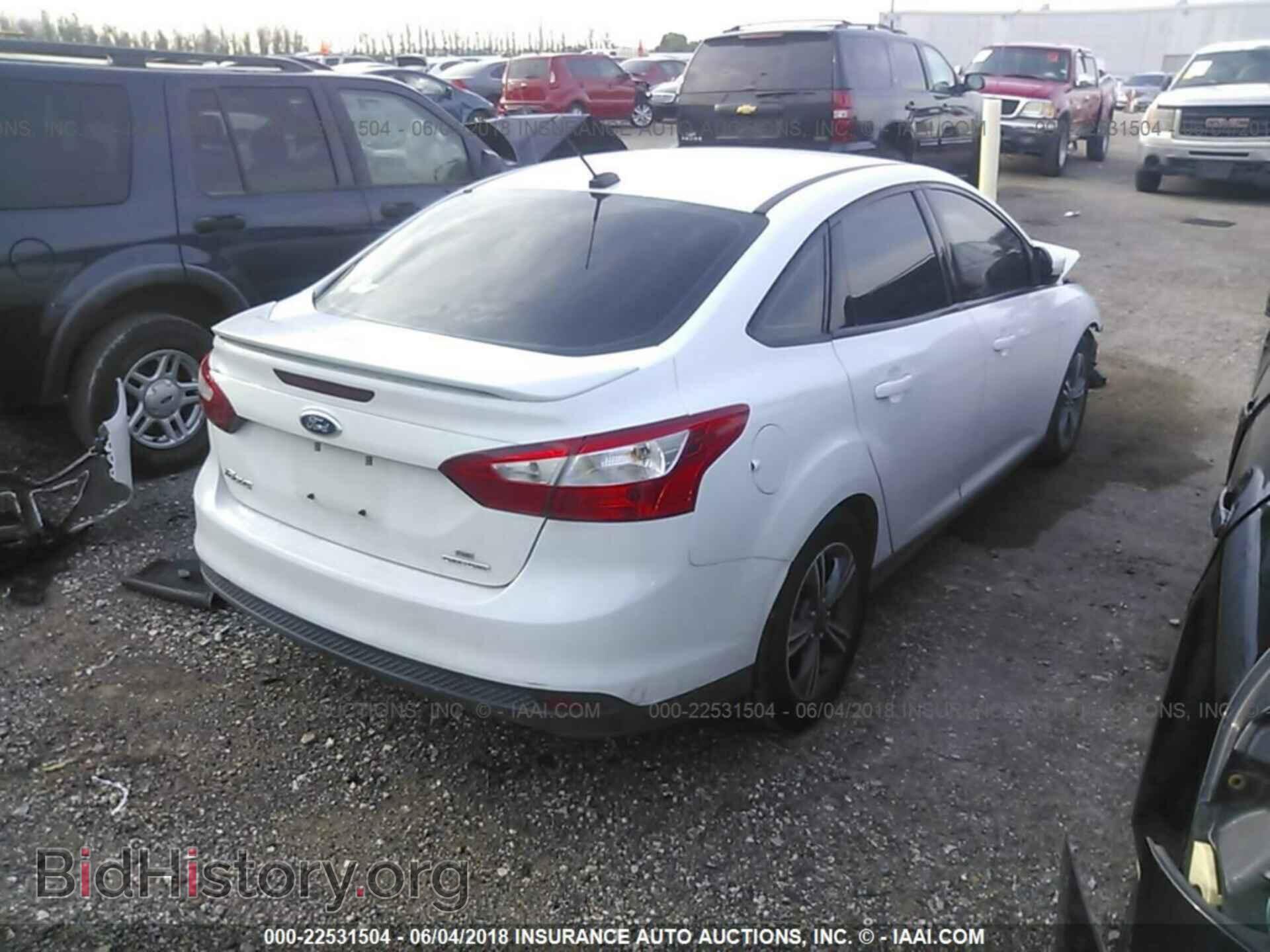 2014 Ford Focus - VIN: 1FADP3F24EL293579 - Photo 4