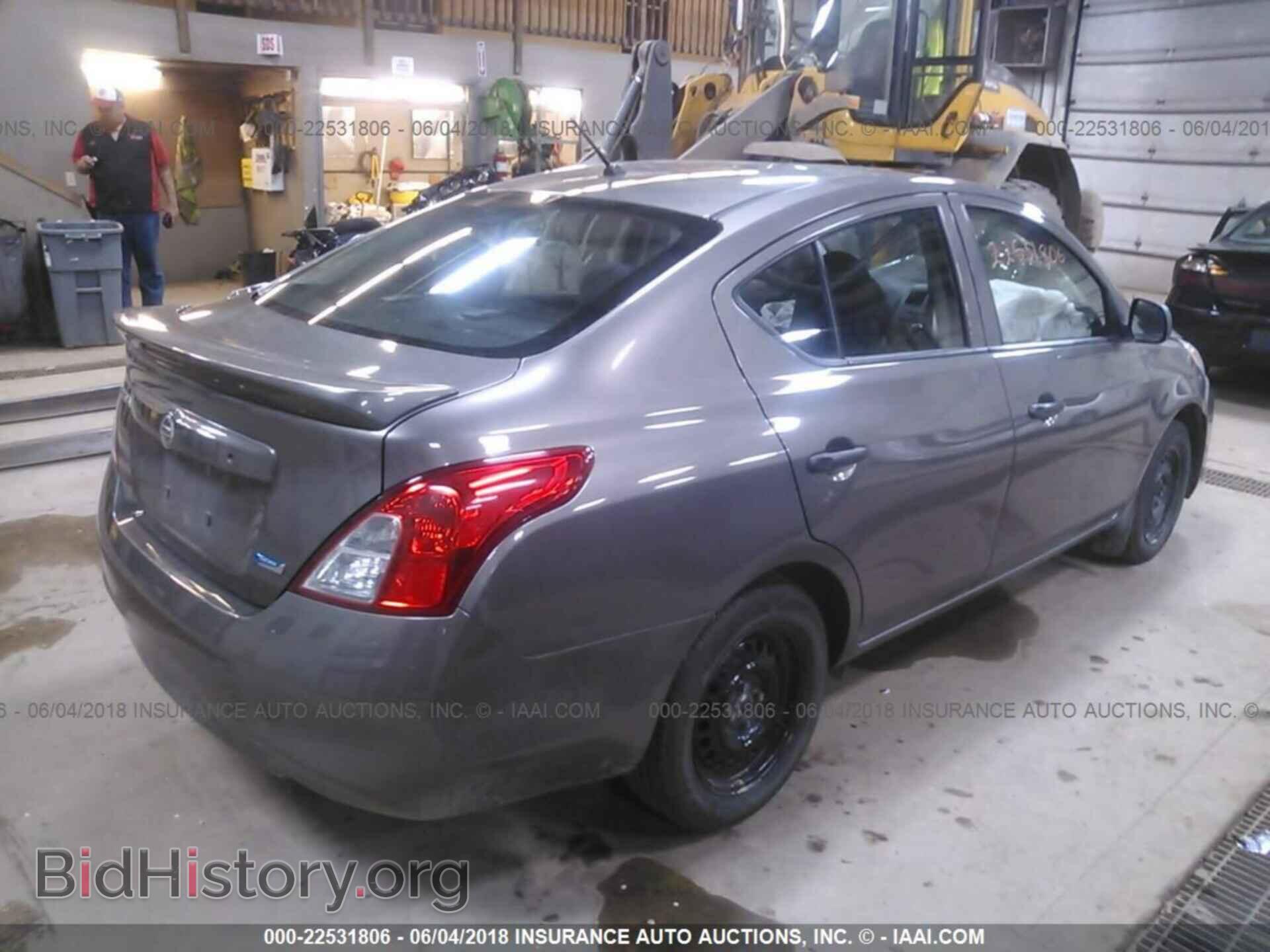 2014 Nissan Versa - VIN: 3N1CN7AP2EL854438 - Фото 4