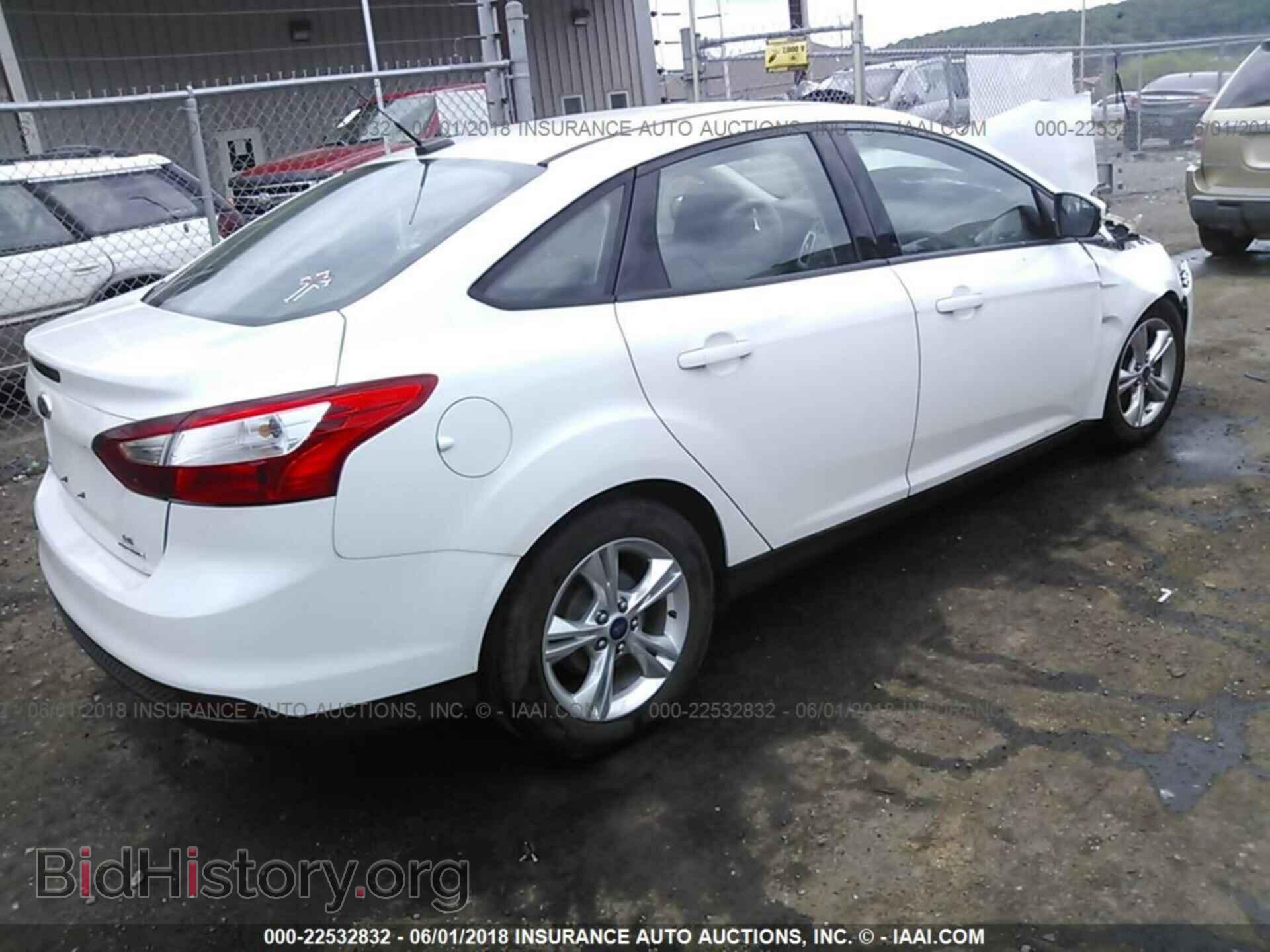 2014 Ford Focus - VIN: 1FADP3F2XEL174449 - Photo 4