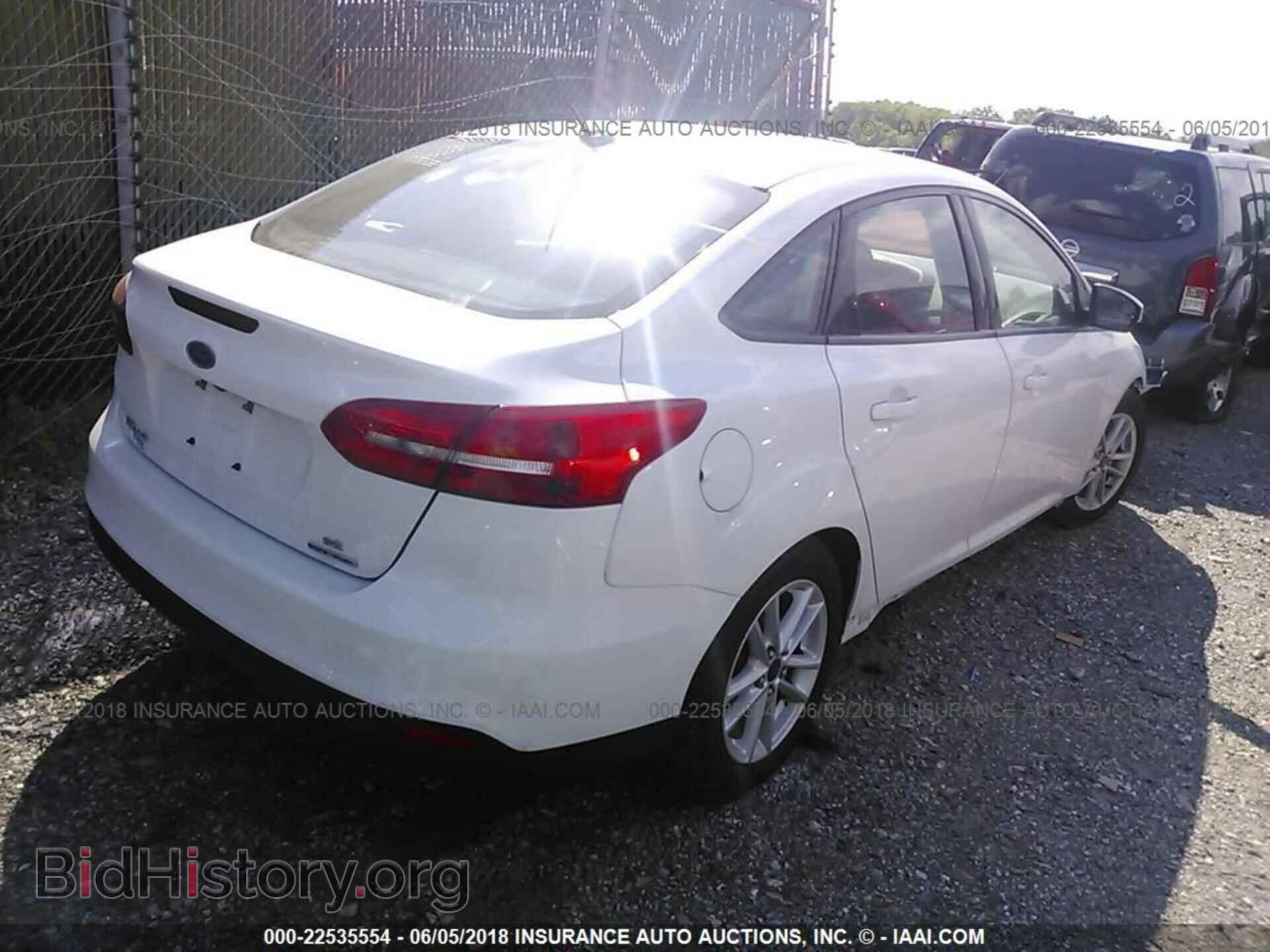 2015 Ford Focus - VIN: 1FADP3F28FL329470 - Фото 4
