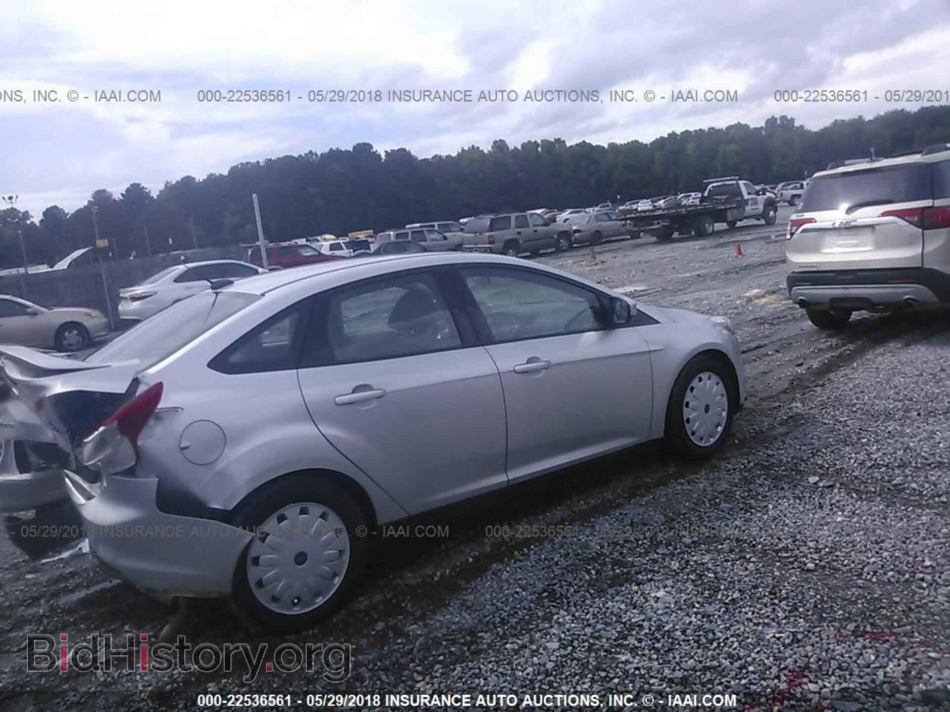 2014 Ford Focus - VIN: 1FADP3F26EL251446 - Photo 4