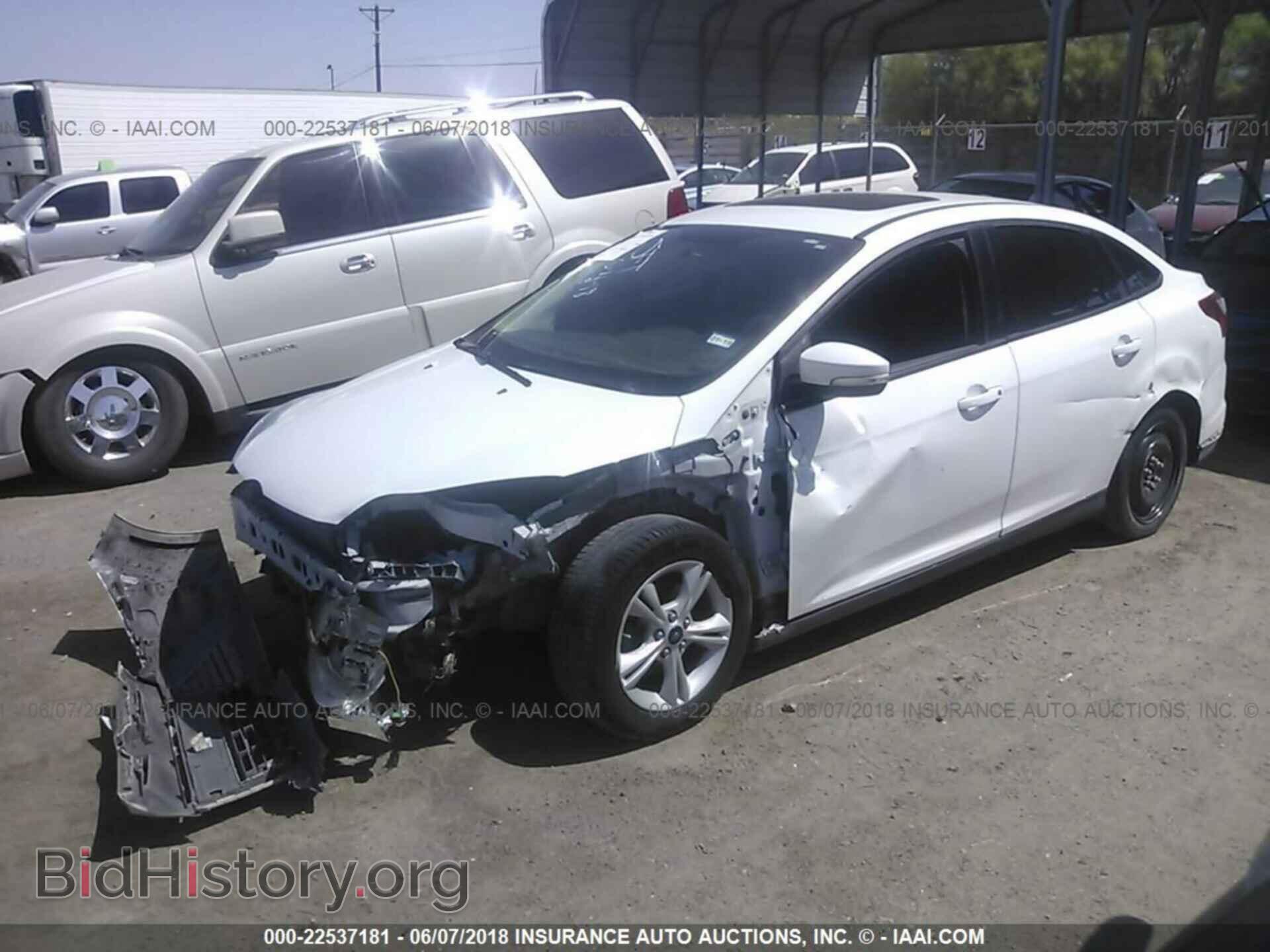 2014 Ford Focus - VIN: 1FADP3F29EL412839 - Фото 2