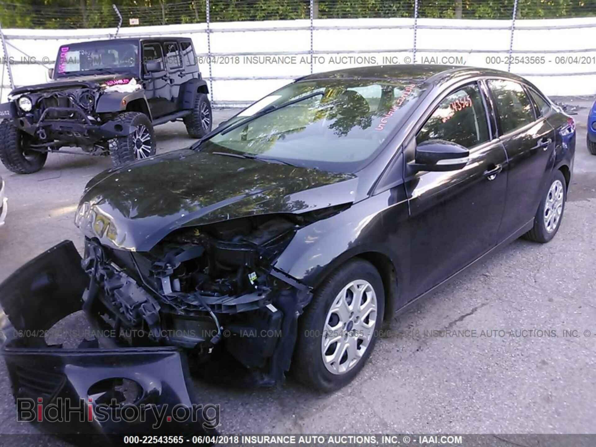 2014 Ford Focus - VIN: 1FADP3F29EL331436 - Фото 2