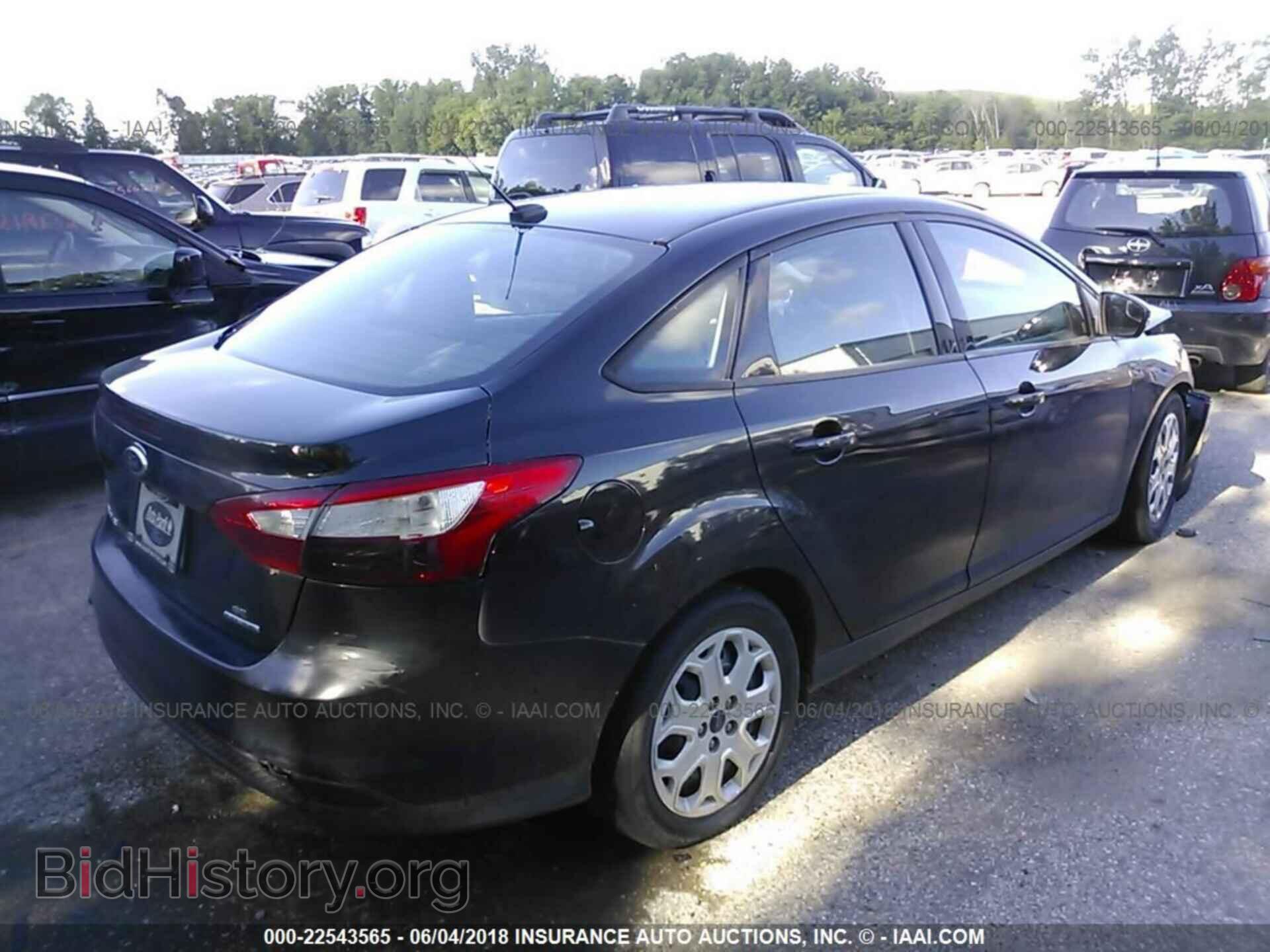 2014 Ford Focus - VIN: 1FADP3F29EL331436 - Фото 4