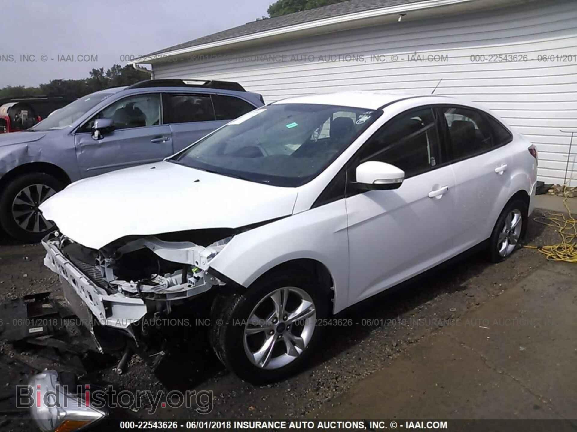 2014 Ford Focus - VIN: 1FADP3F22EL354184 - Фото 2