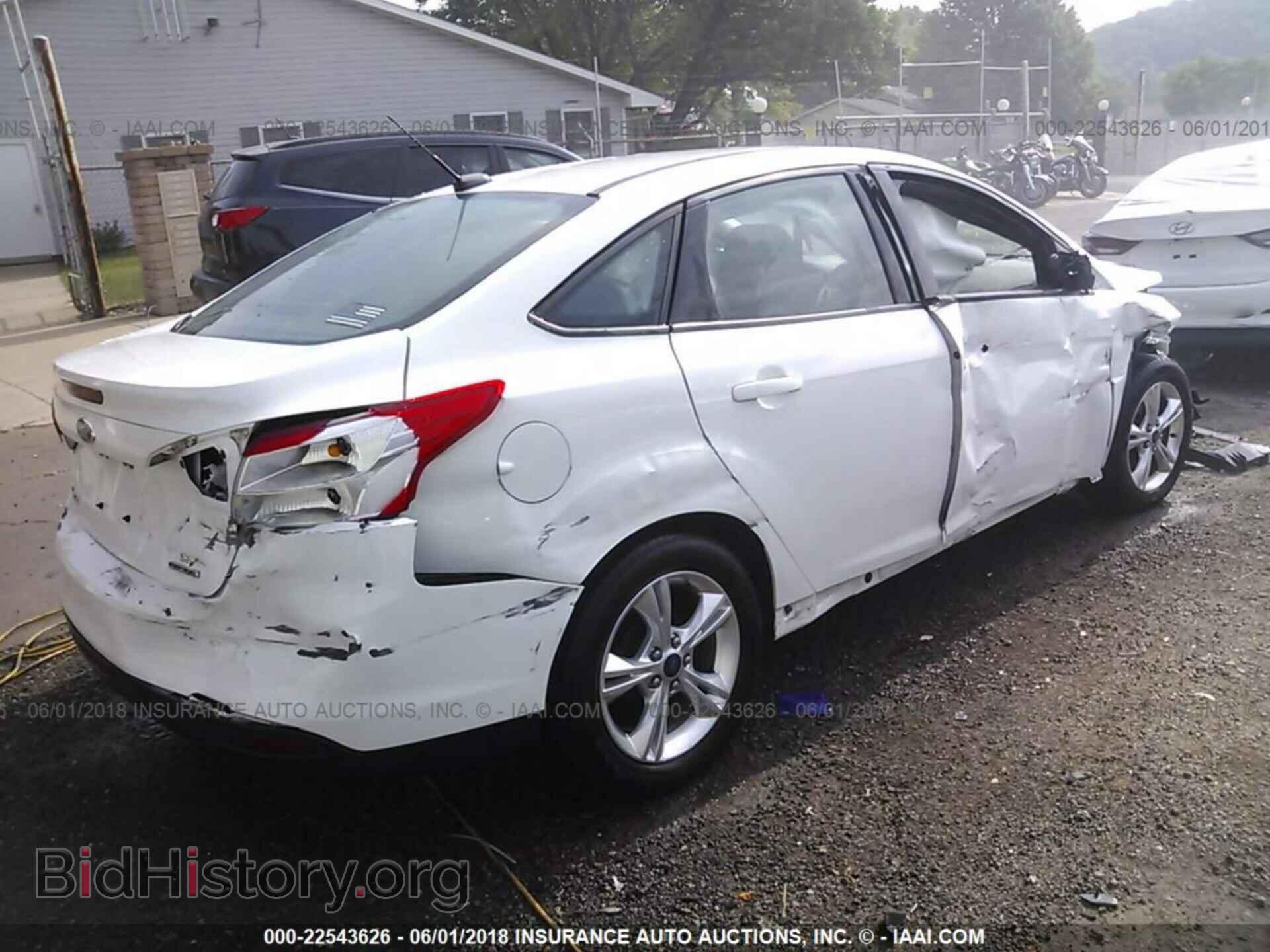 2014 Ford Focus - VIN: 1FADP3F22EL354184 - Фото 4