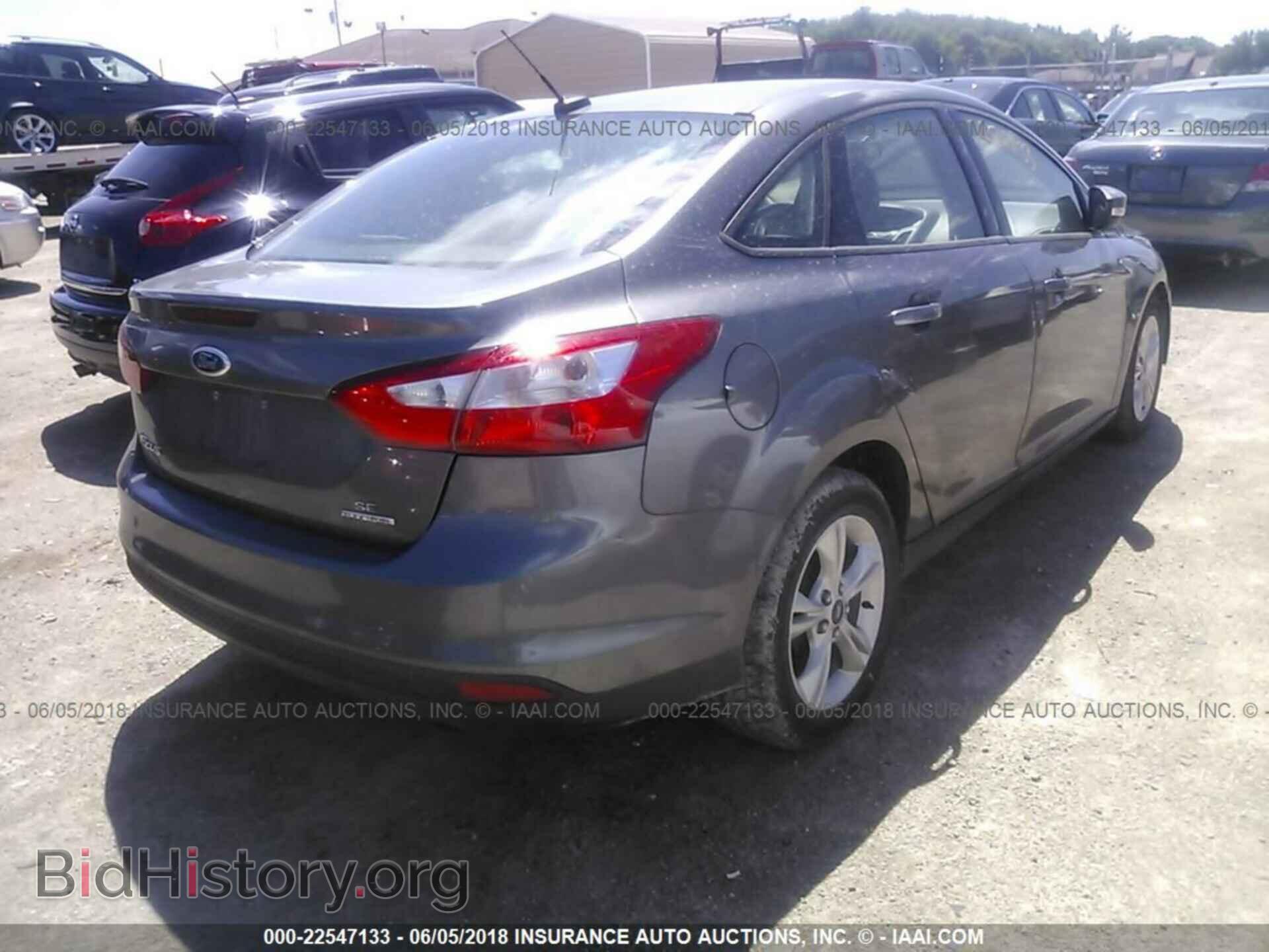 2014 Ford Focus - VIN: 1FADP3F25EL397238 - Photo 4