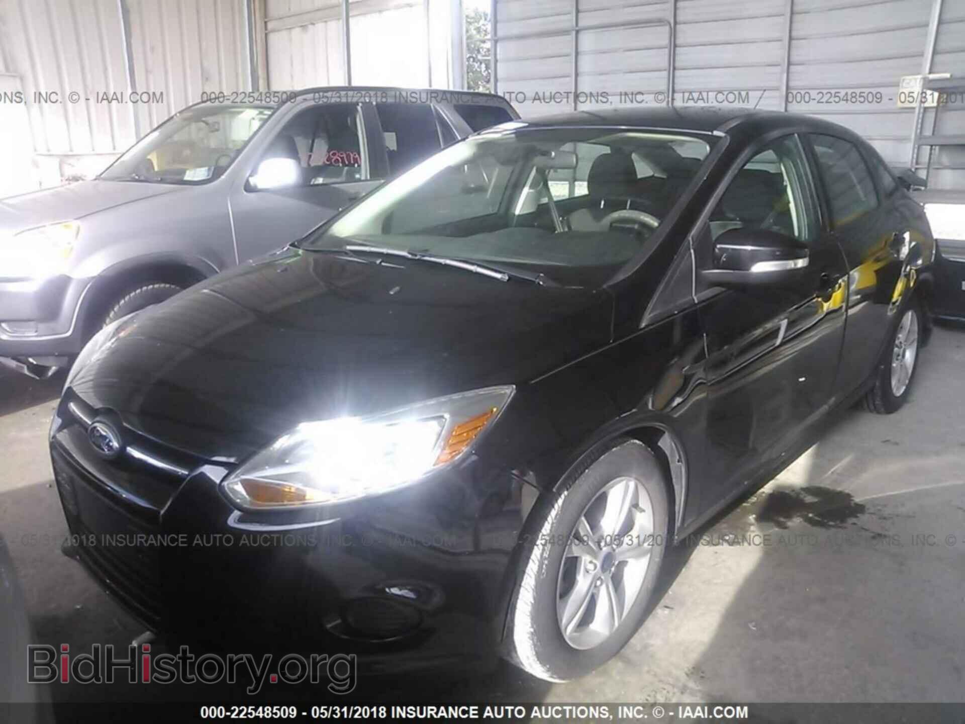 2014 Ford Focus - VIN: 1FADP3F20EL338520 - Photo 2