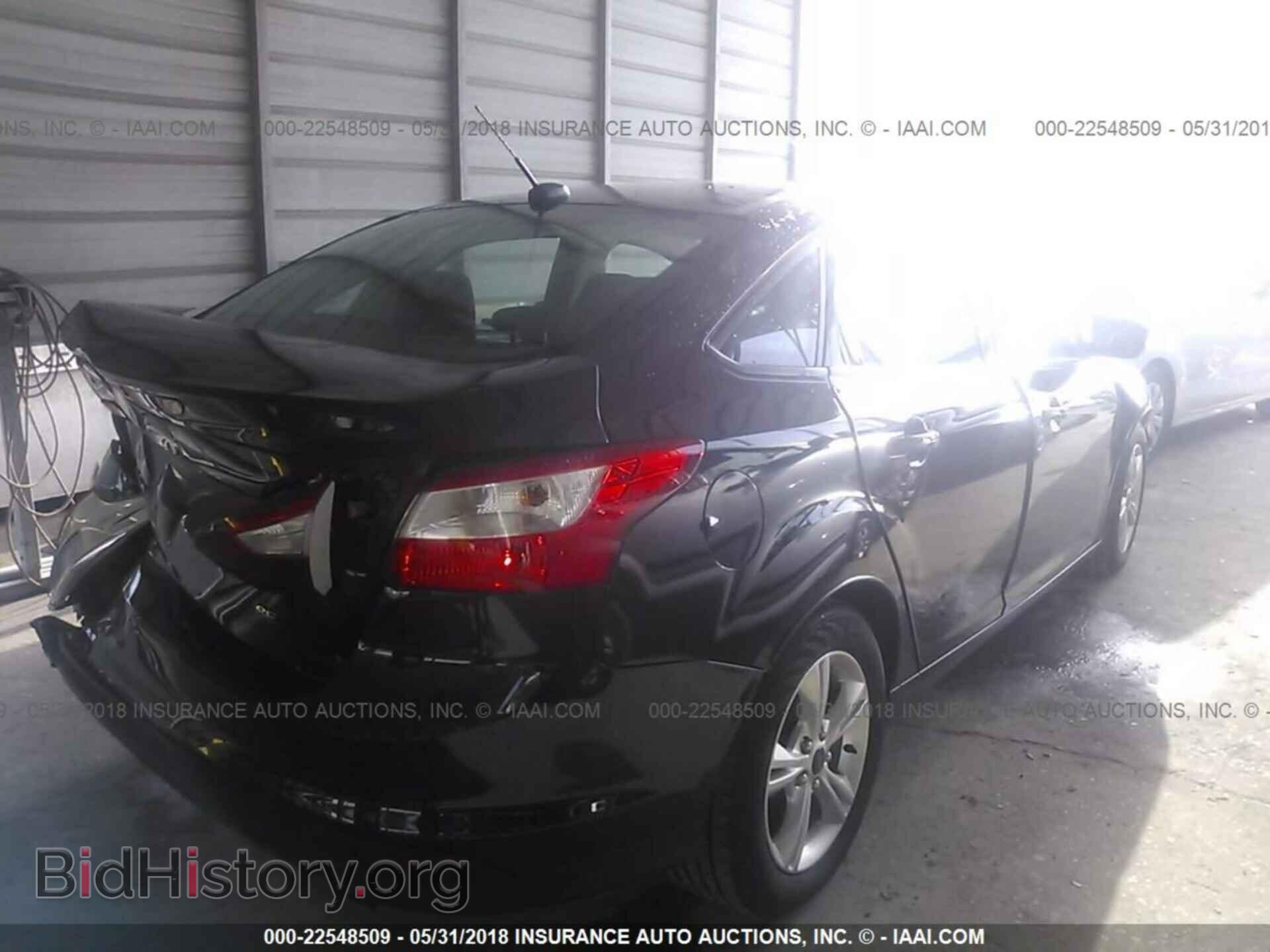 2014 Ford Focus - VIN: 1FADP3F20EL338520 - Photo 4