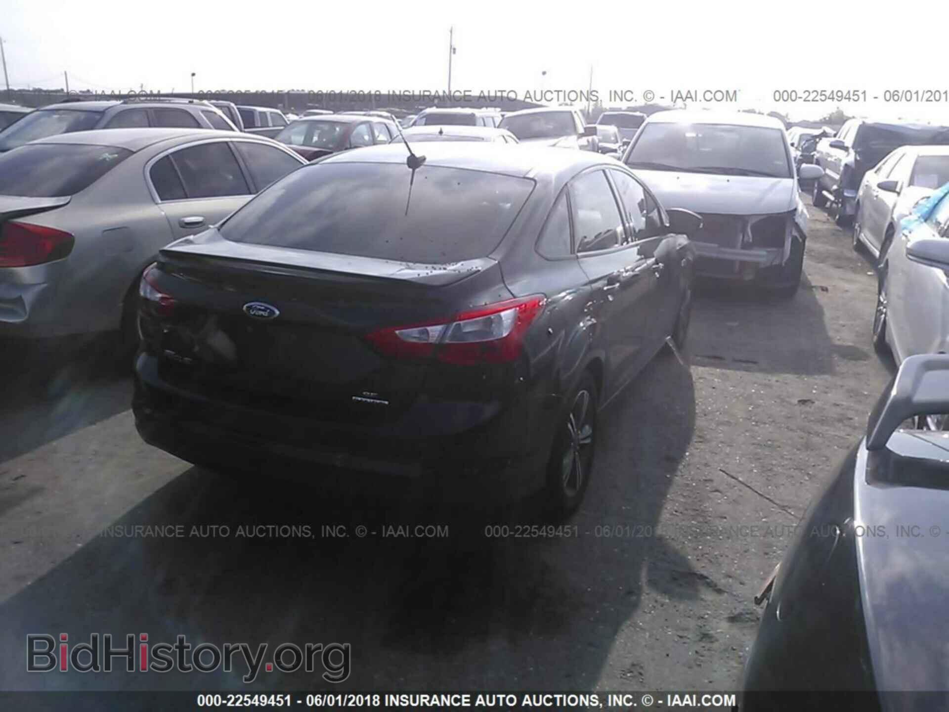 2014 Ford Focus - VIN: 1FADP3F21EL286573 - Фото 4