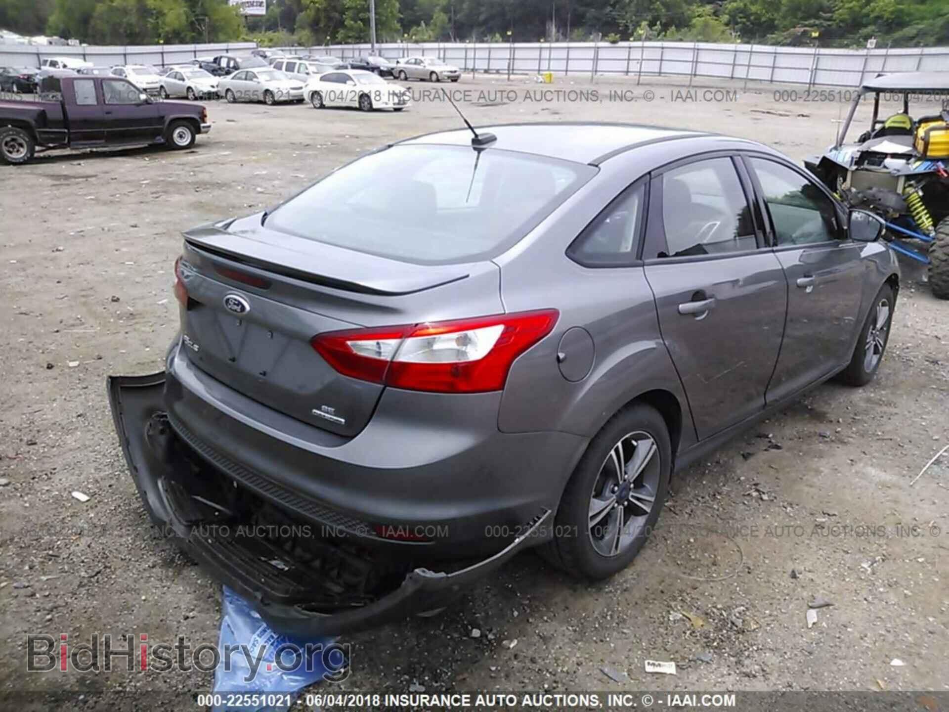 2014 Ford Focus - VIN: 1FADP3F20EL387359 - Photo 4
