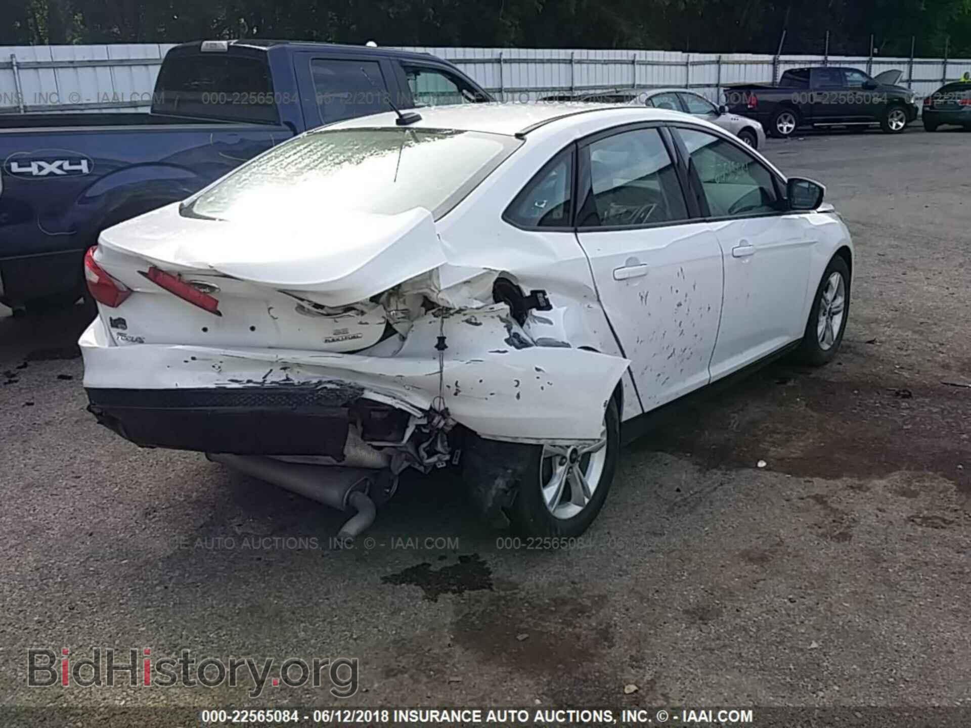 2014 Ford Focus - VIN: 1FADP3F29EL398828 - Photo 4