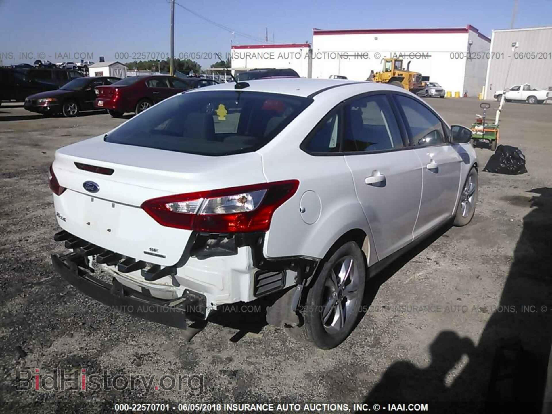 2014 Ford Focus - VIN: 1FADP3F21EL354306 - Photo 4