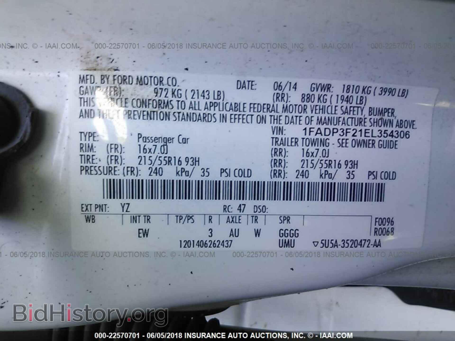 2014 Ford Focus - VIN: 1FADP3F21EL354306 - Photo 9