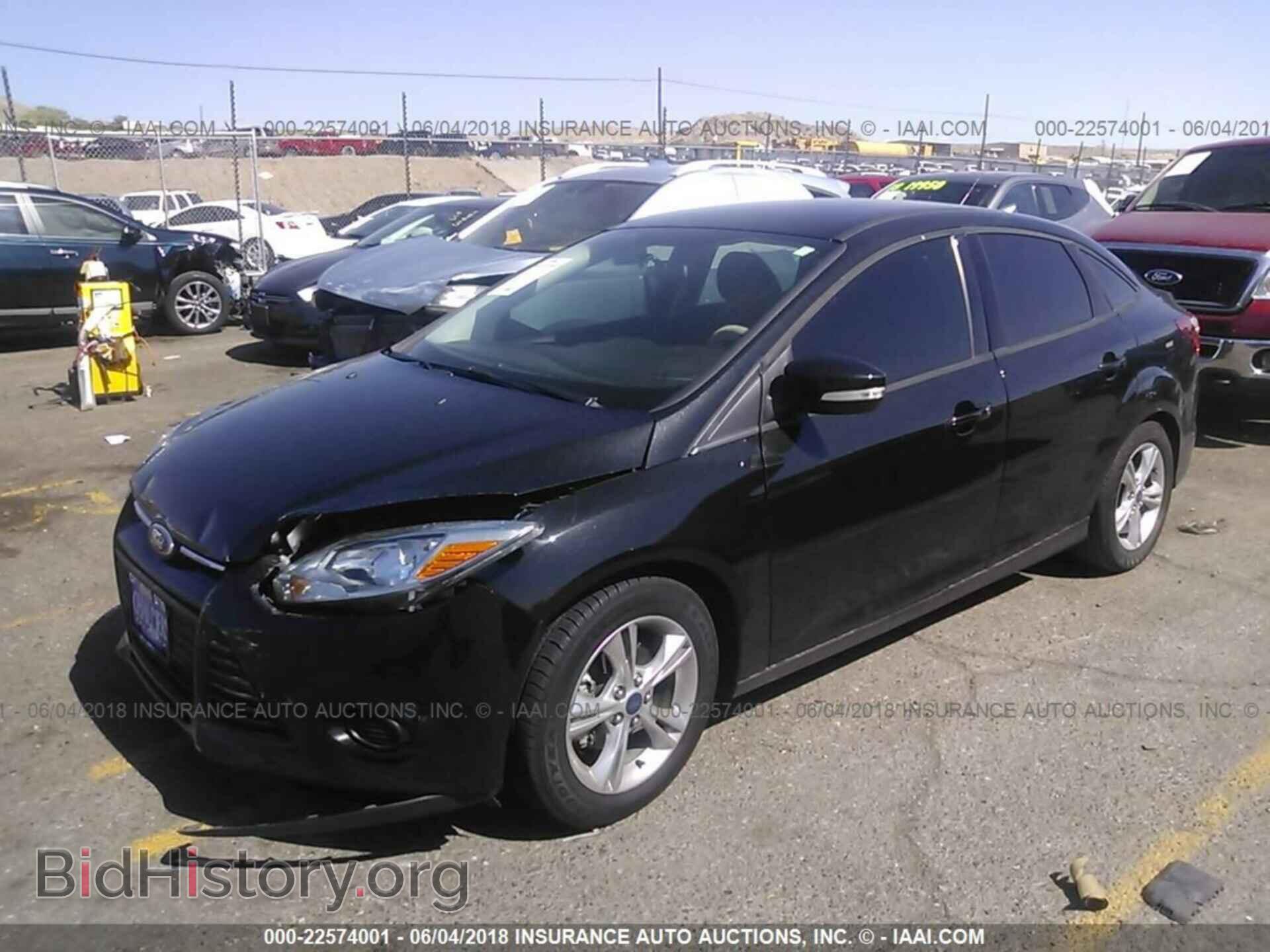 2014 Ford Focus - VIN: 1FADP3F21EL197649 - Photo 2
