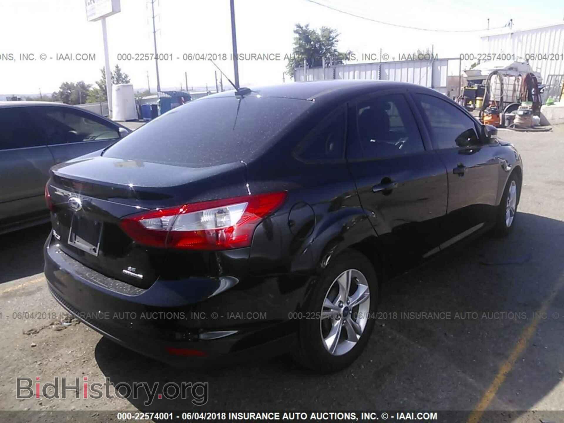 2014 Ford Focus - VIN: 1FADP3F21EL197649 - Photo 4