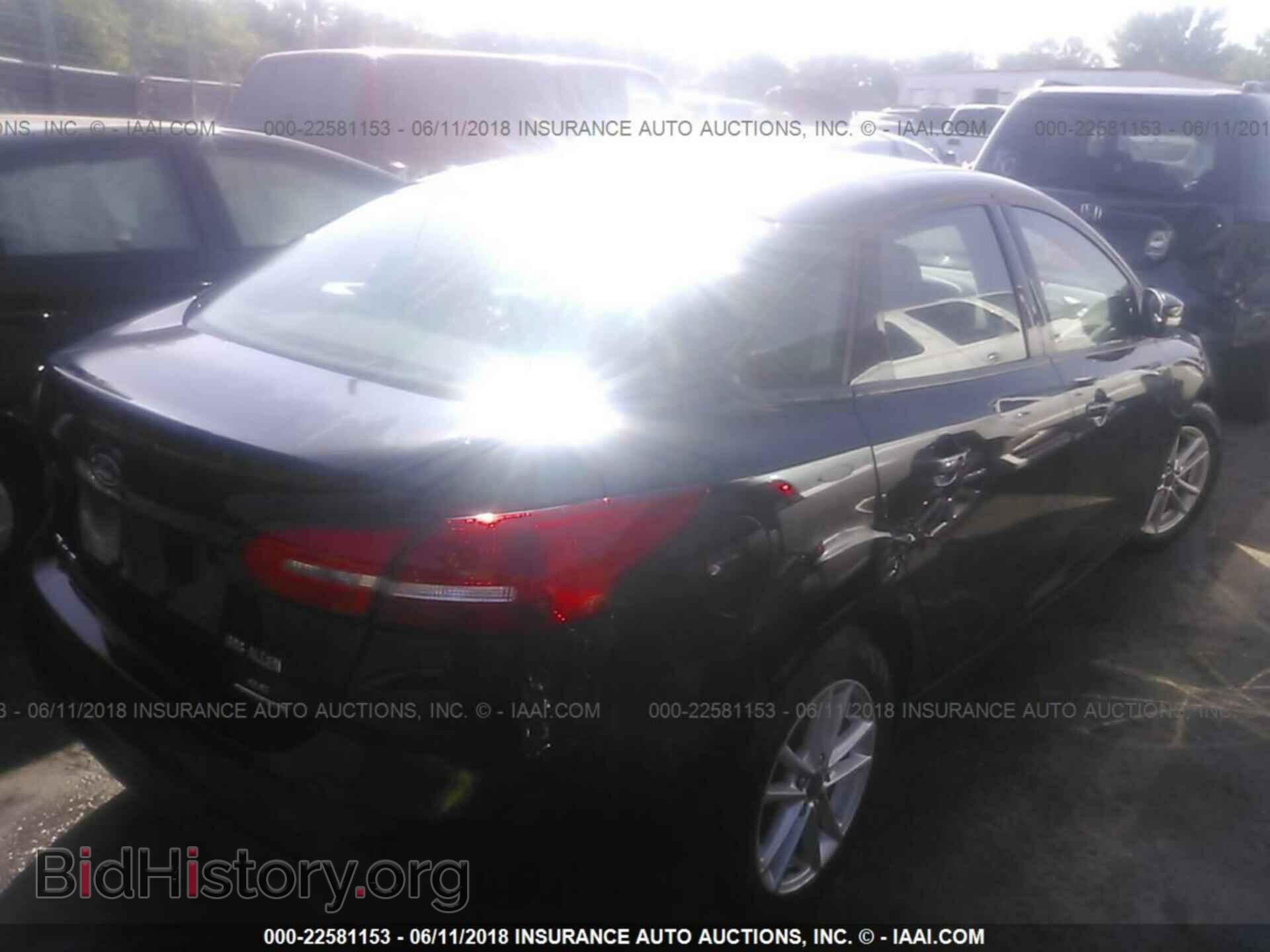 2016 Ford Focus - VIN: 1FADP3F2XGL379417 - Photo 4