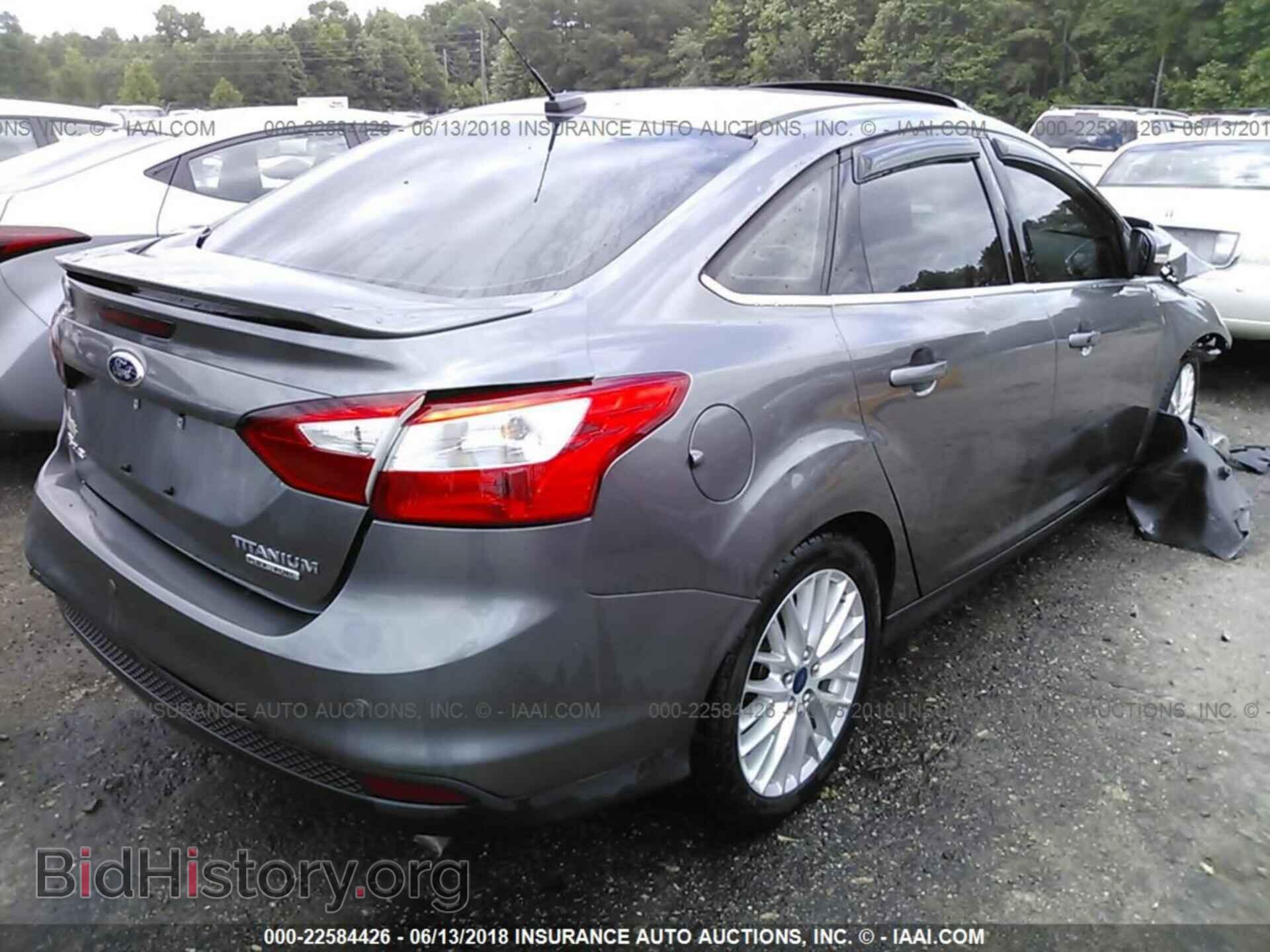 2014 Ford Focus - VIN: 1FADP3J29EL402934 - Фото 4