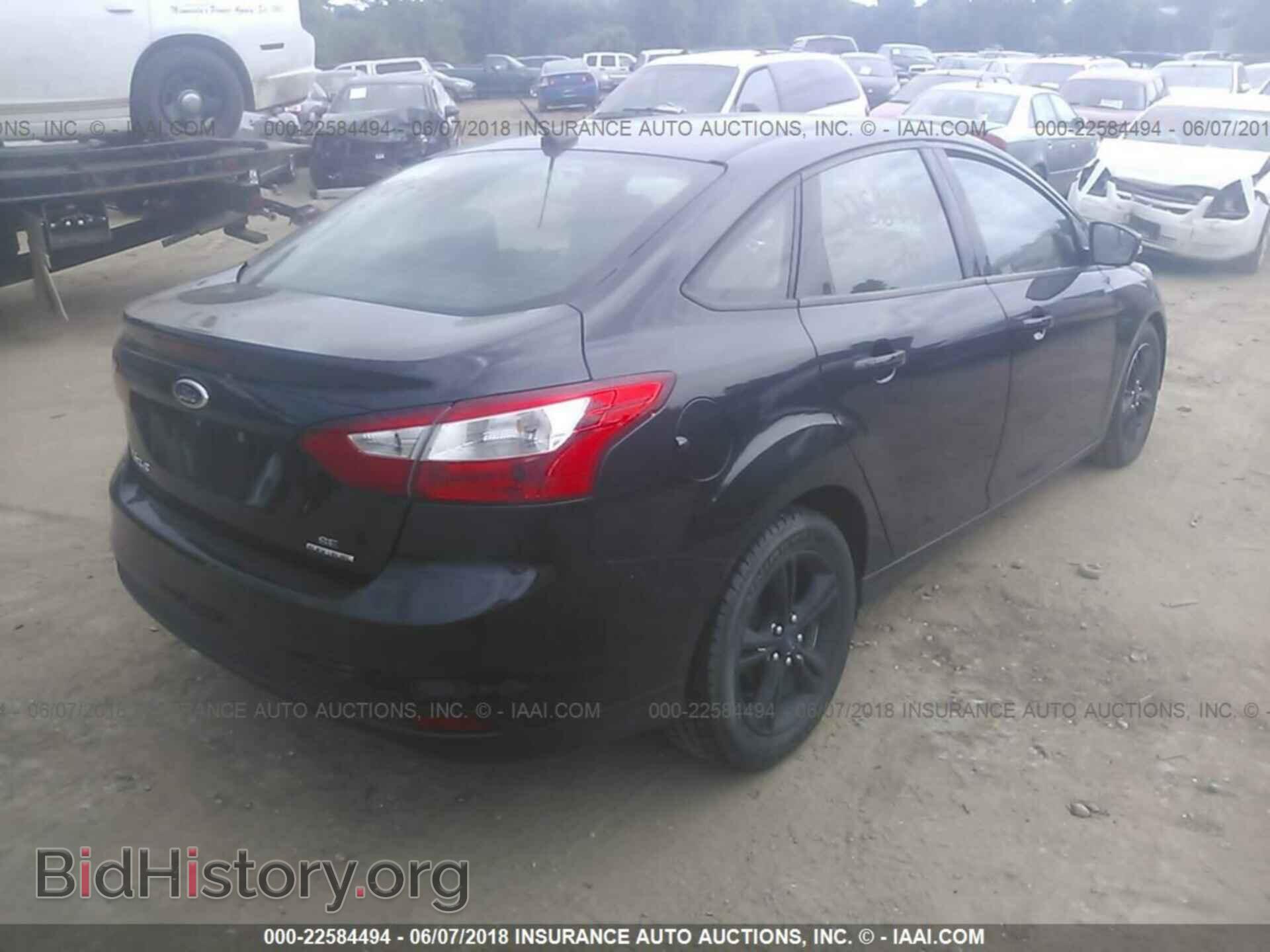 2014 Ford Focus - VIN: 1FADP3F28EL135973 - Photo 4