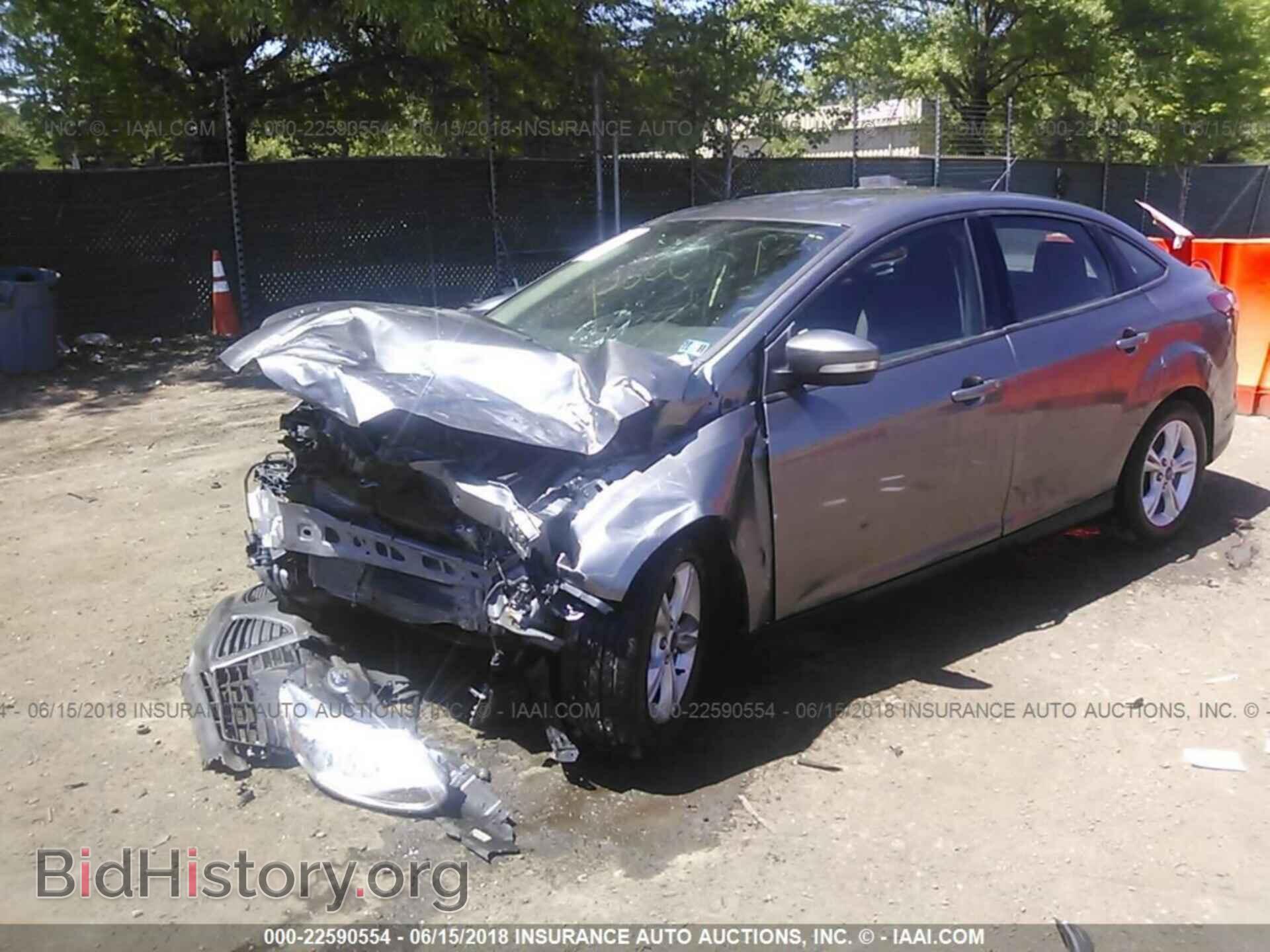 2014 Ford Focus - VIN: 1FADP3F26EL404777 - Фото 2