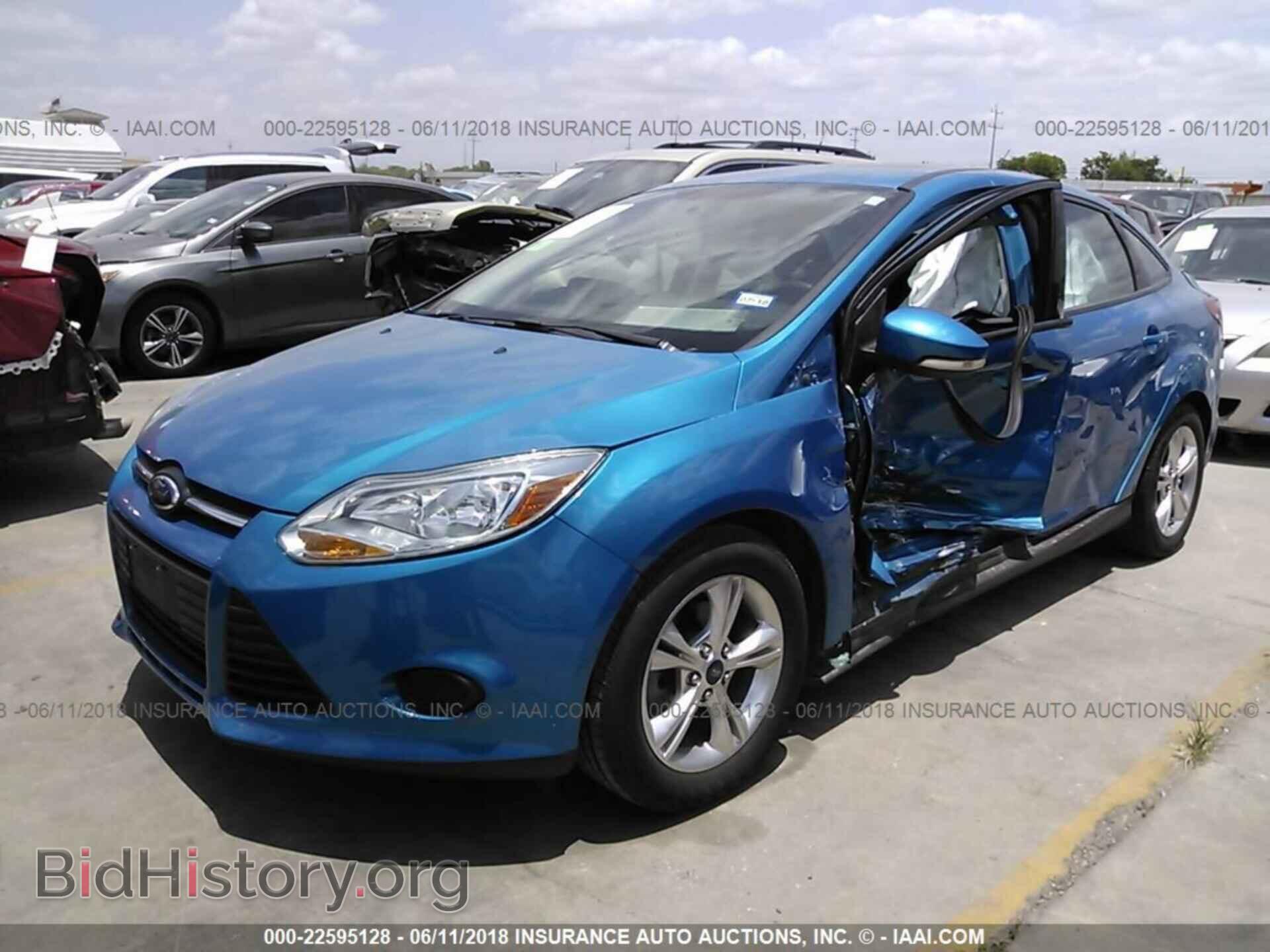 2014 Ford Focus - VIN: 1FADP3F20EL301905 - Фото 2