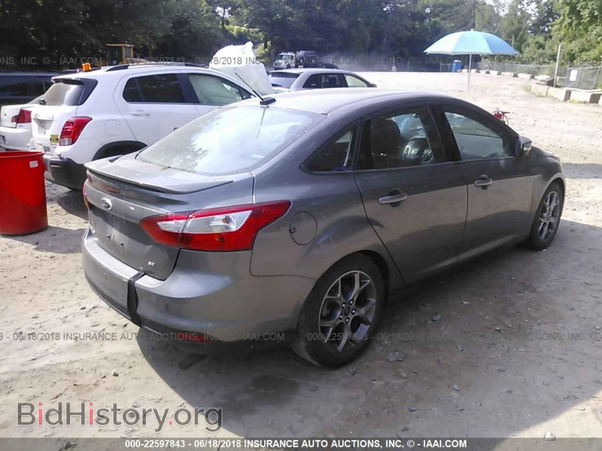 2014 Ford Focus - VIN: 1FADP3F20EL178641 - Фото 4