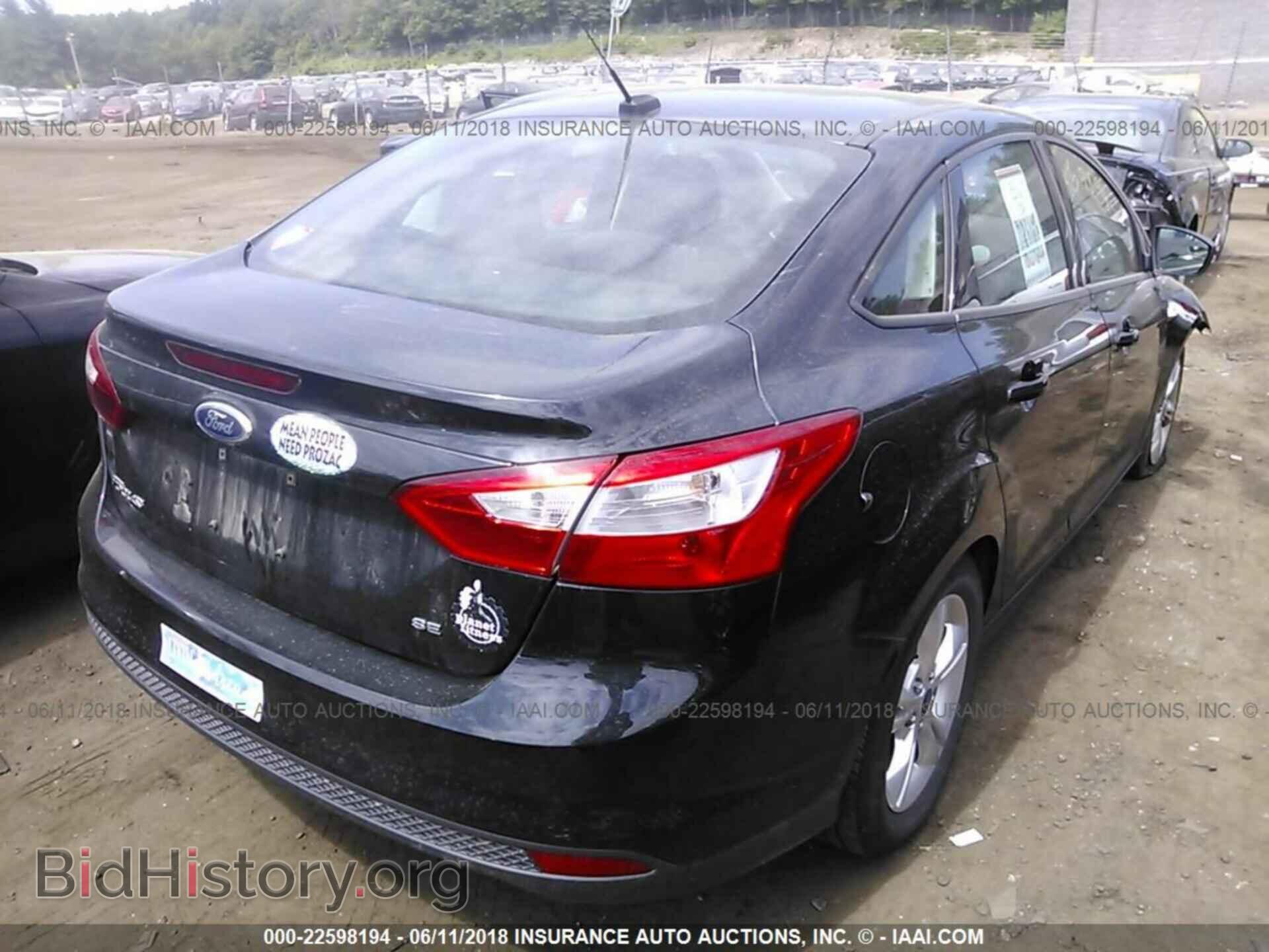 2014 Ford Focus - VIN: 1FADP3F20EL306294 - Фото 4