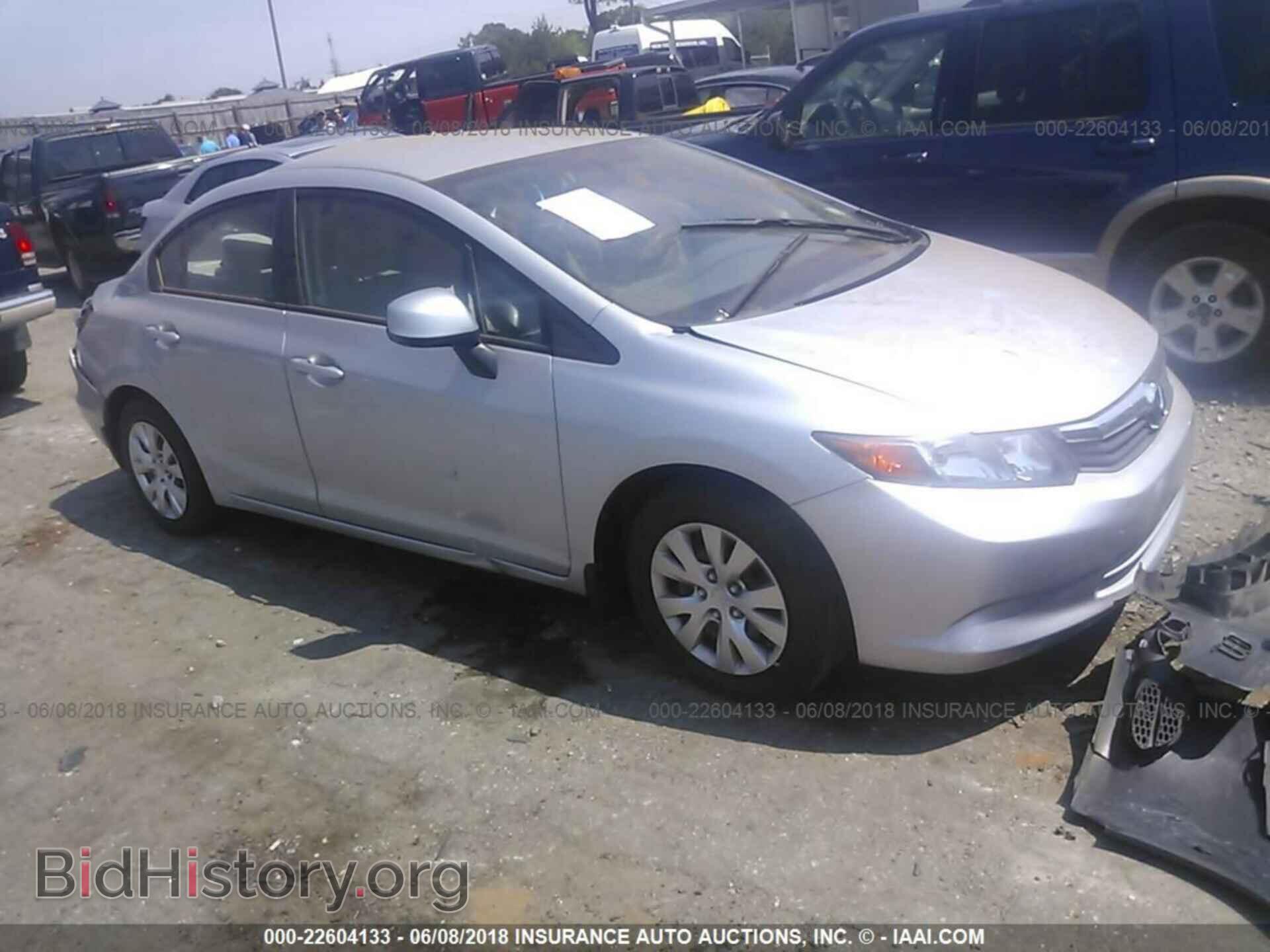 2012 Honda CIVIC (VIN 2HGFB2F52CH573518) — фото 1 из 10, IAAI, повреждение: крыша