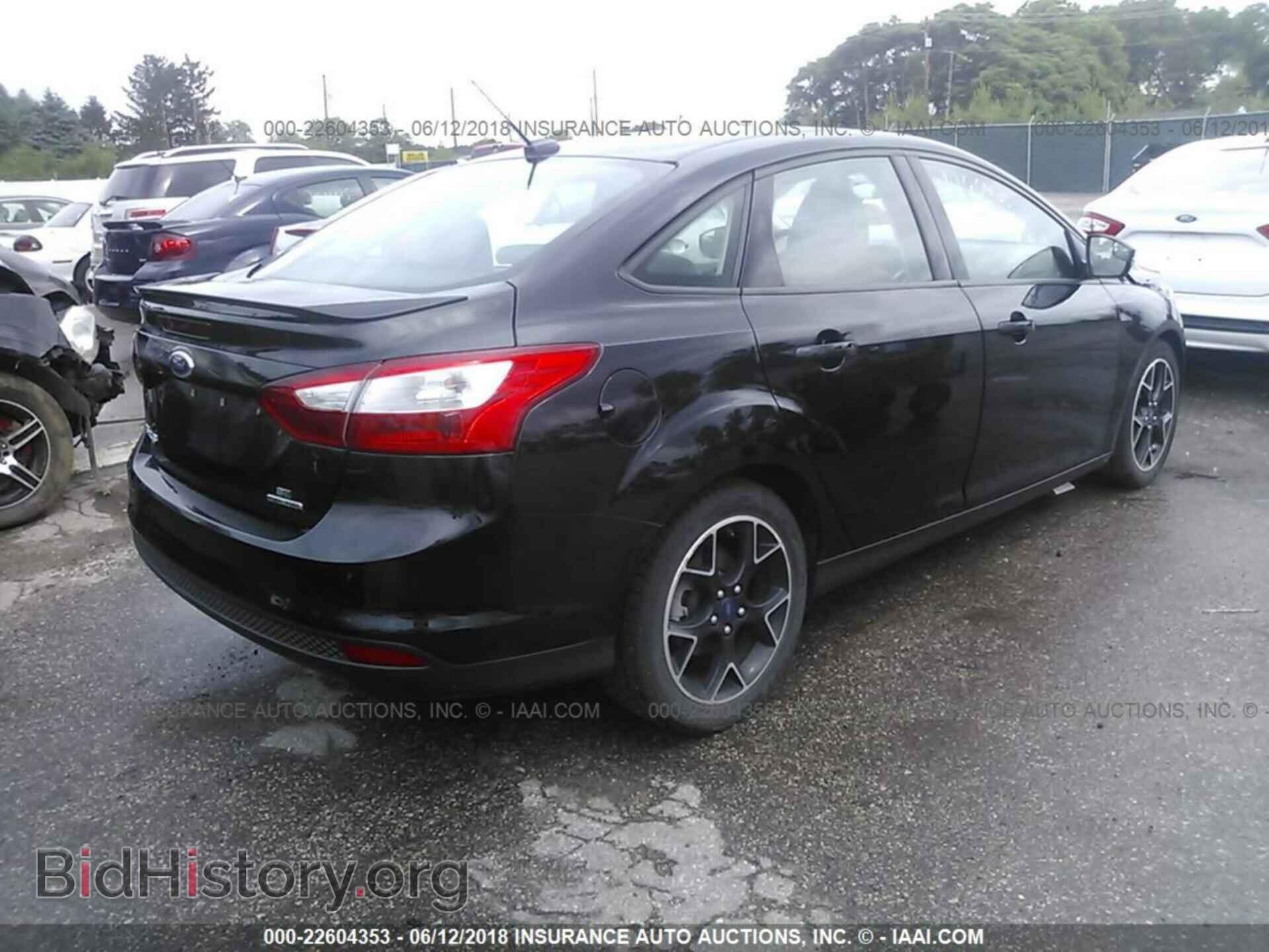 2013 Ford Focus - VIN: 1FADP3F24DL294908 - Photo 4